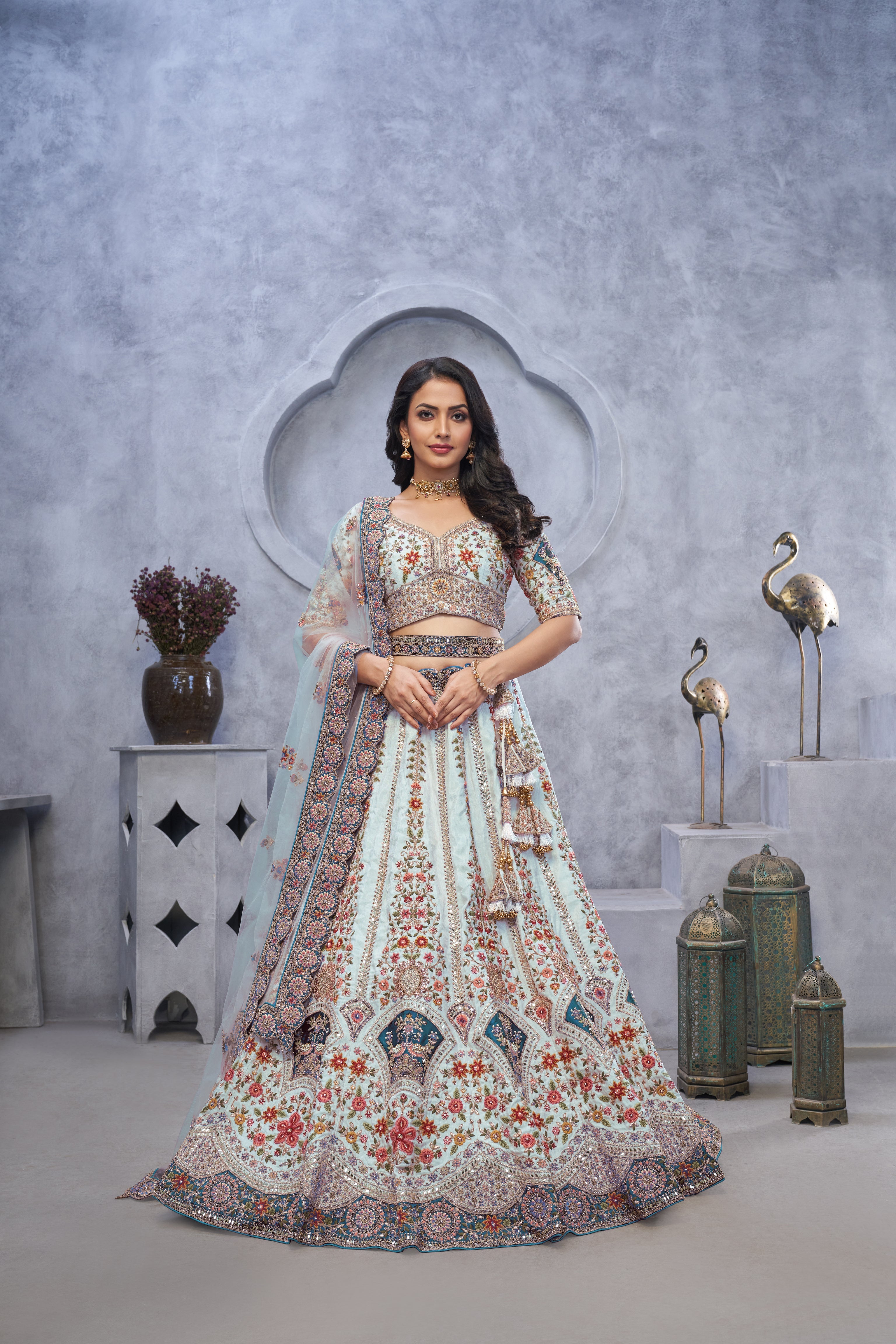 Stunning Sky Blue Lehenga with Zari Paisley Embroidery, Silk Patches, and Peacock Motifs - qivii