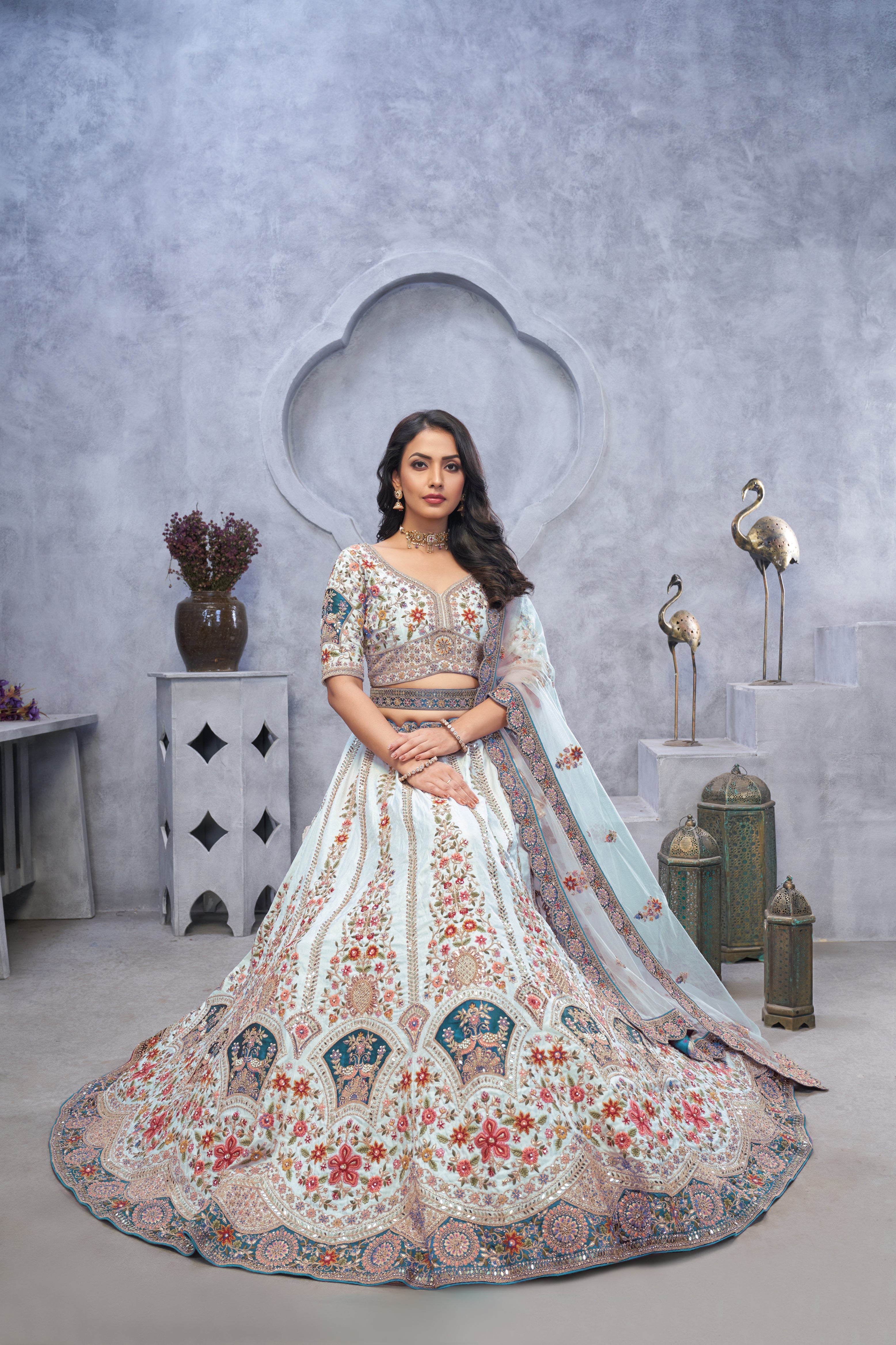 Stunning Sky Blue Lehenga with Zari Paisley Embroidery, Silk Patches, and Peacock Motifs - qivii
