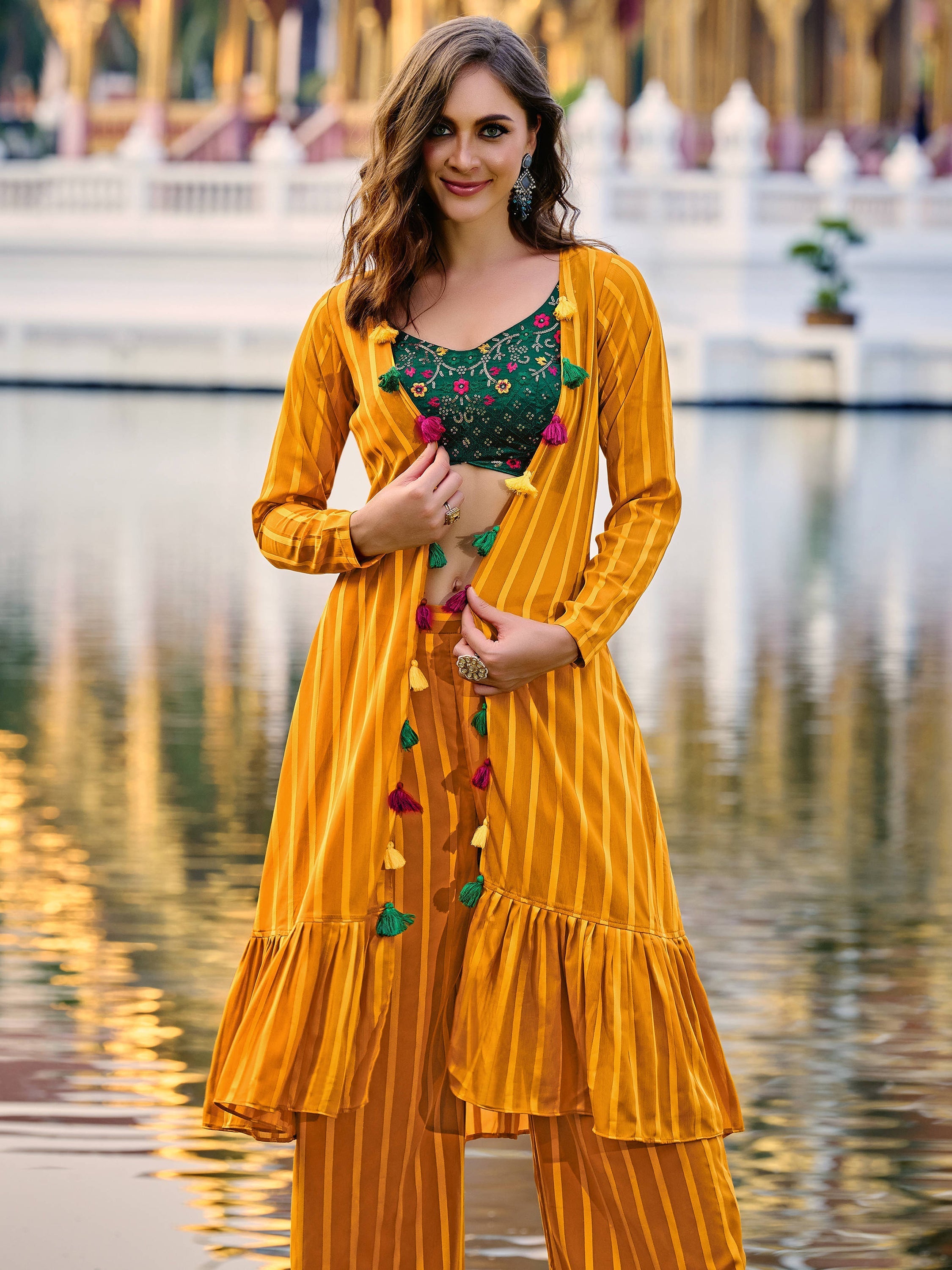 Elegant yellow georgette palazzo suit with intricate embroidery and matching jacket