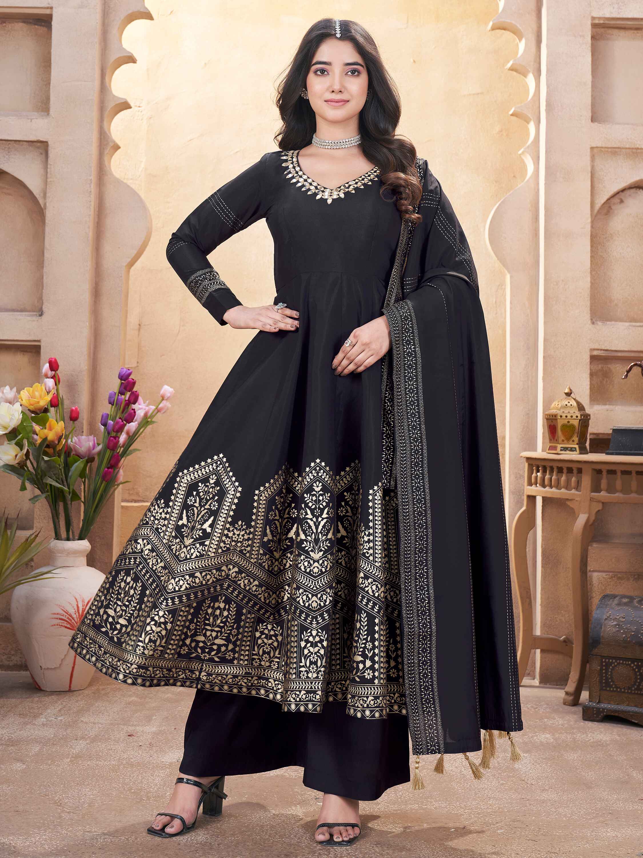 Black Roman silk Anarkali suit with captivating foil print work and mirror accents