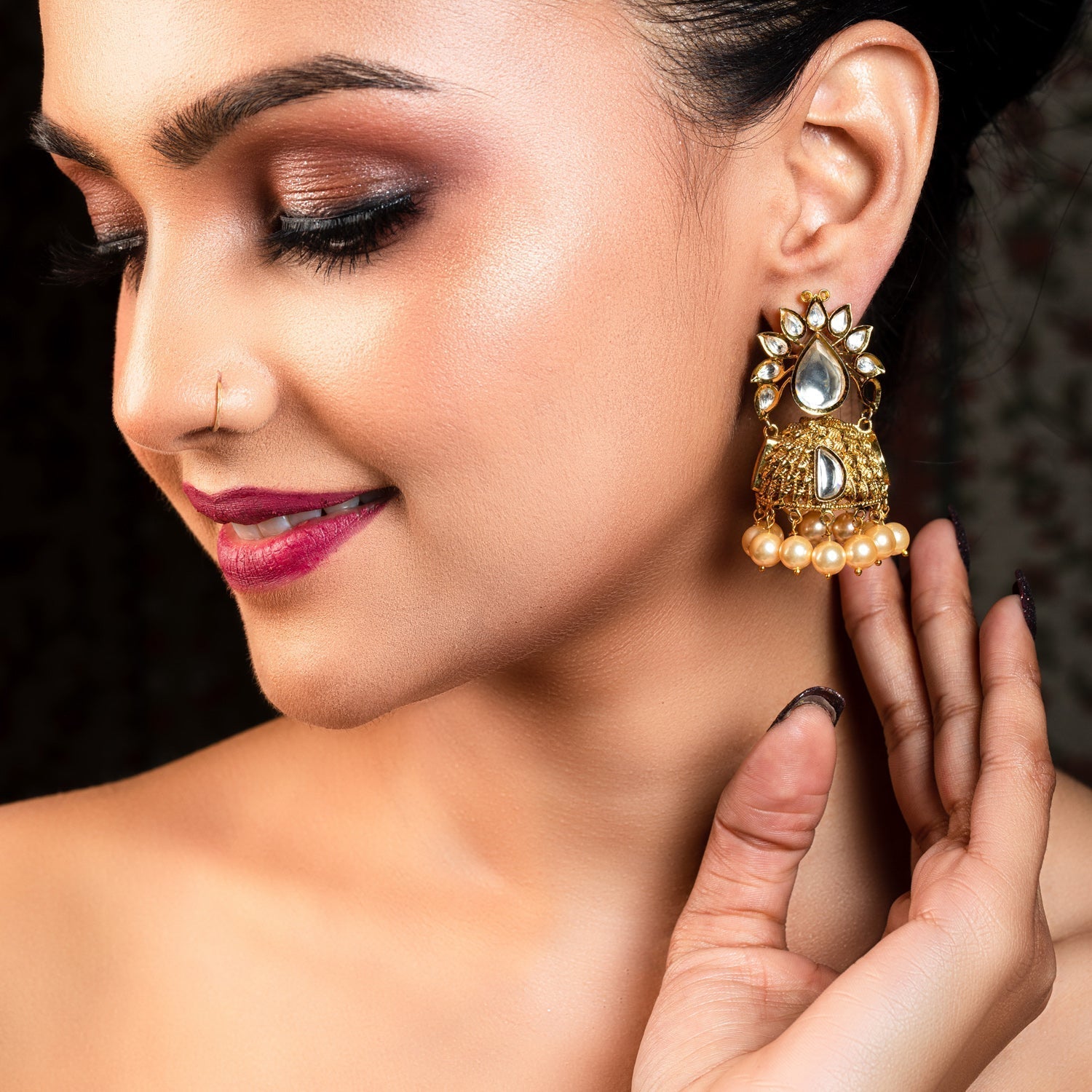 Antique textured small jhumkas with pearl drops and kundan stones