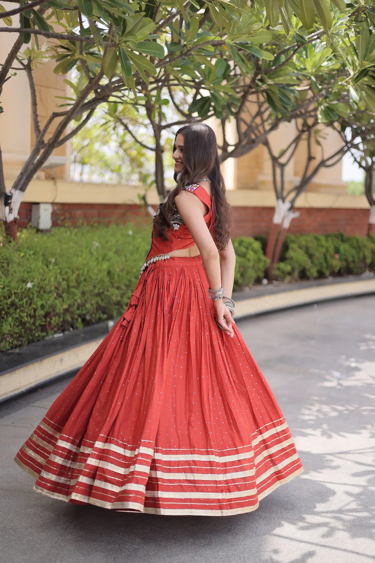 5 Meter Flair | Rust Orange Garba Chaniya Choli With Gamthi & Mirror Work
