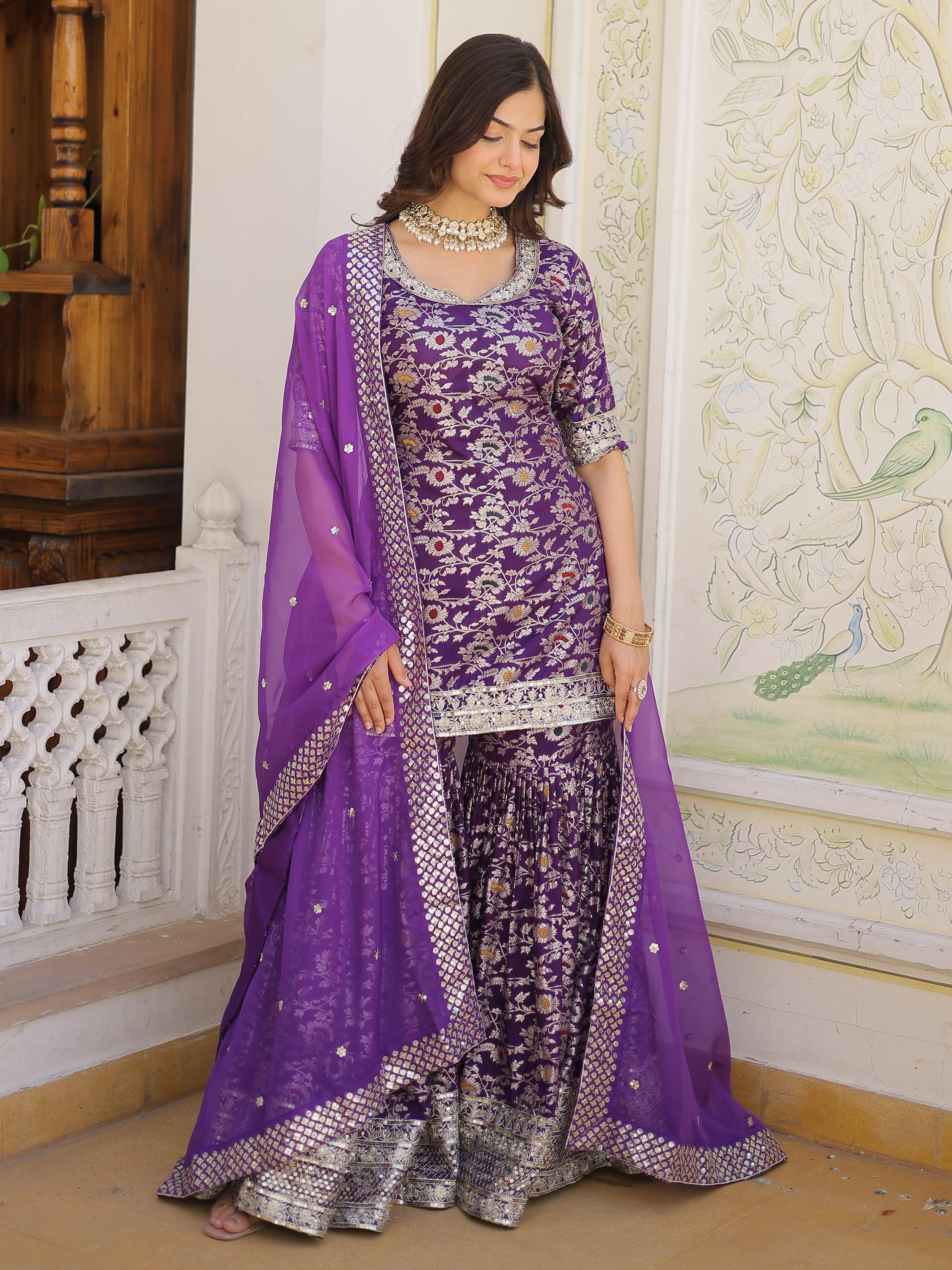 A beautiful purple embroidered jacquard wedding wear sharara suit for women