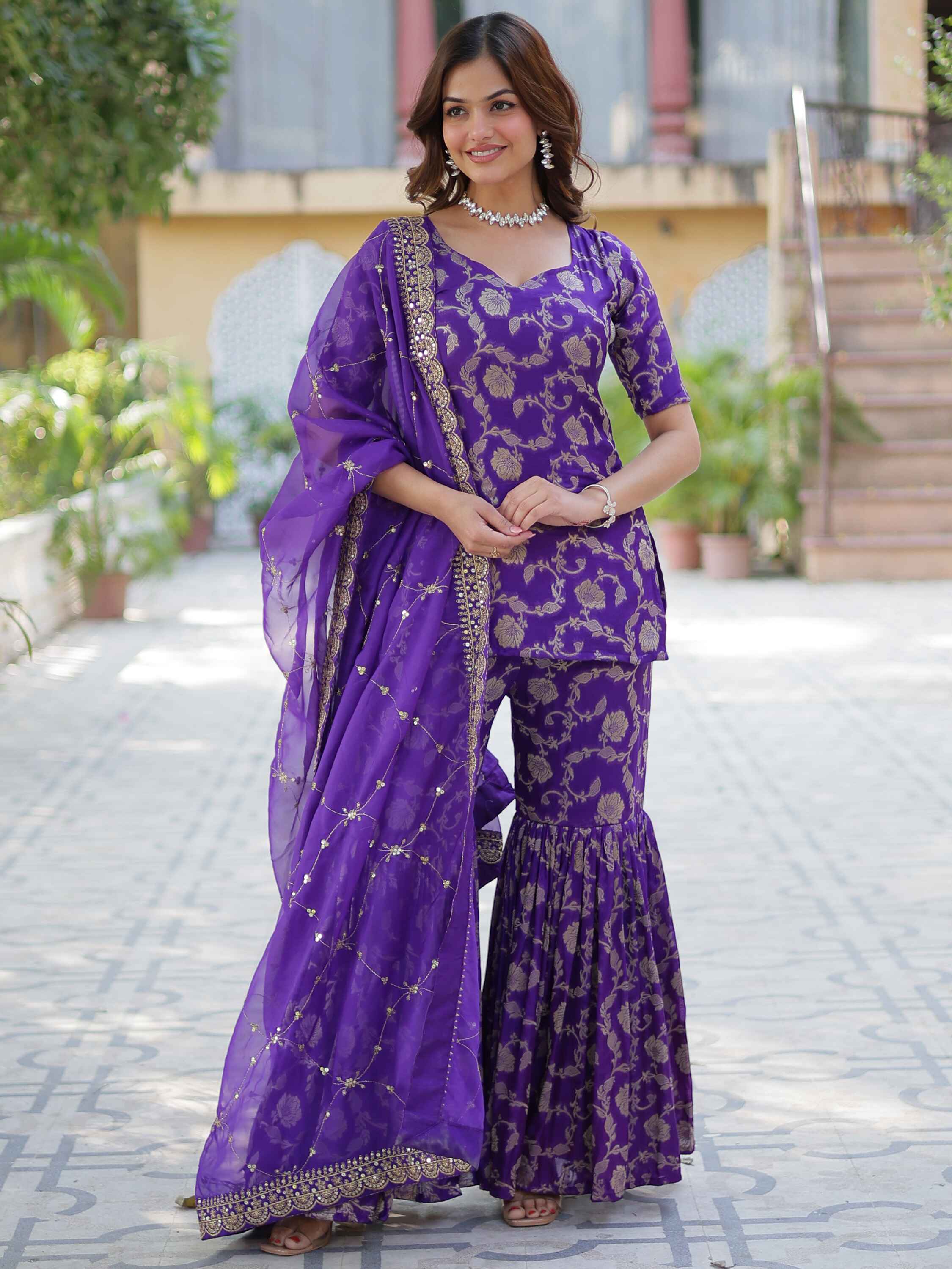 Purple jacquard sharara suit with intricate weaving and delicate sequin embellishments