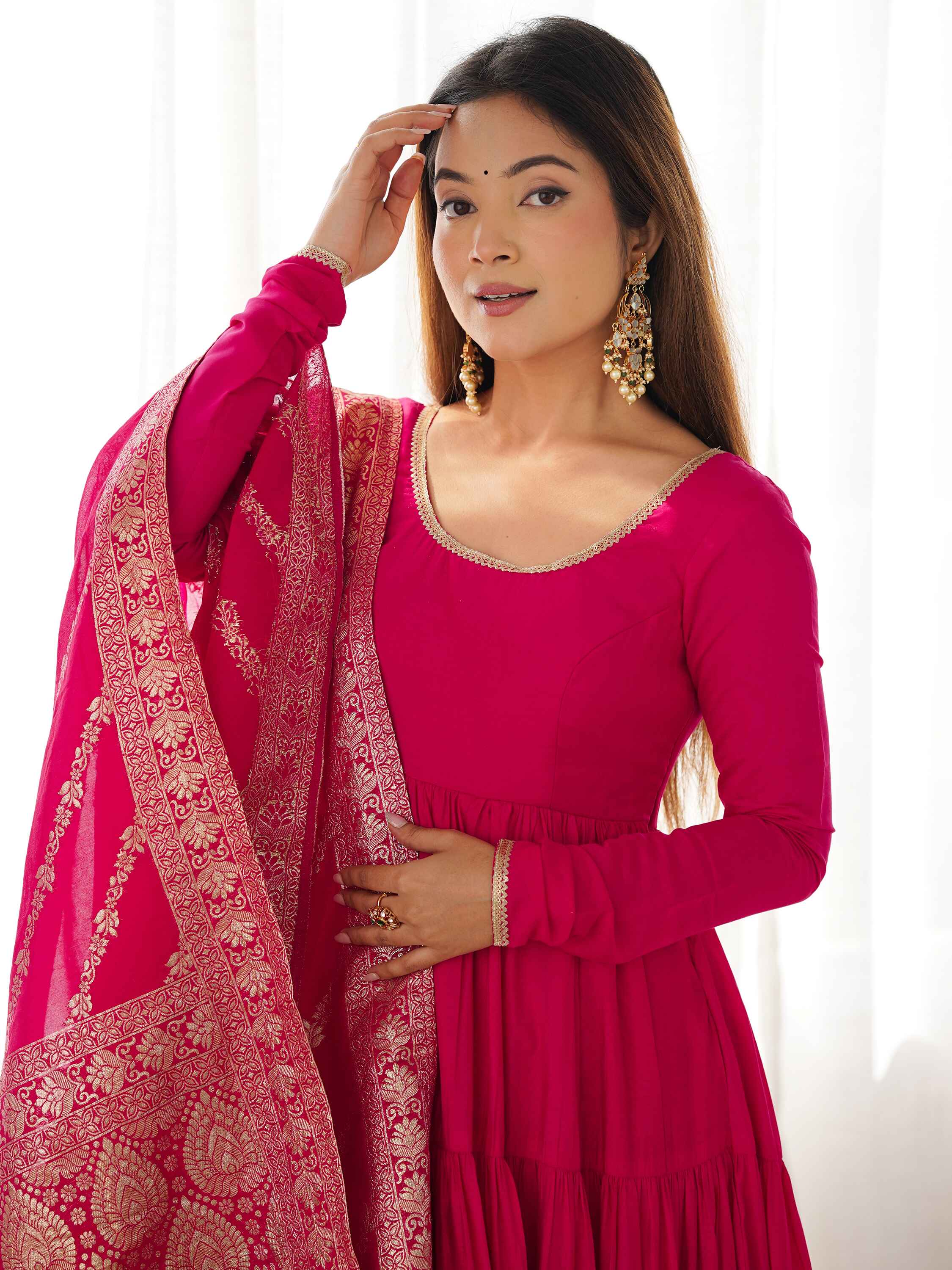 Exquisite hot pink banarsi silk dupatta completing the stunning outfit