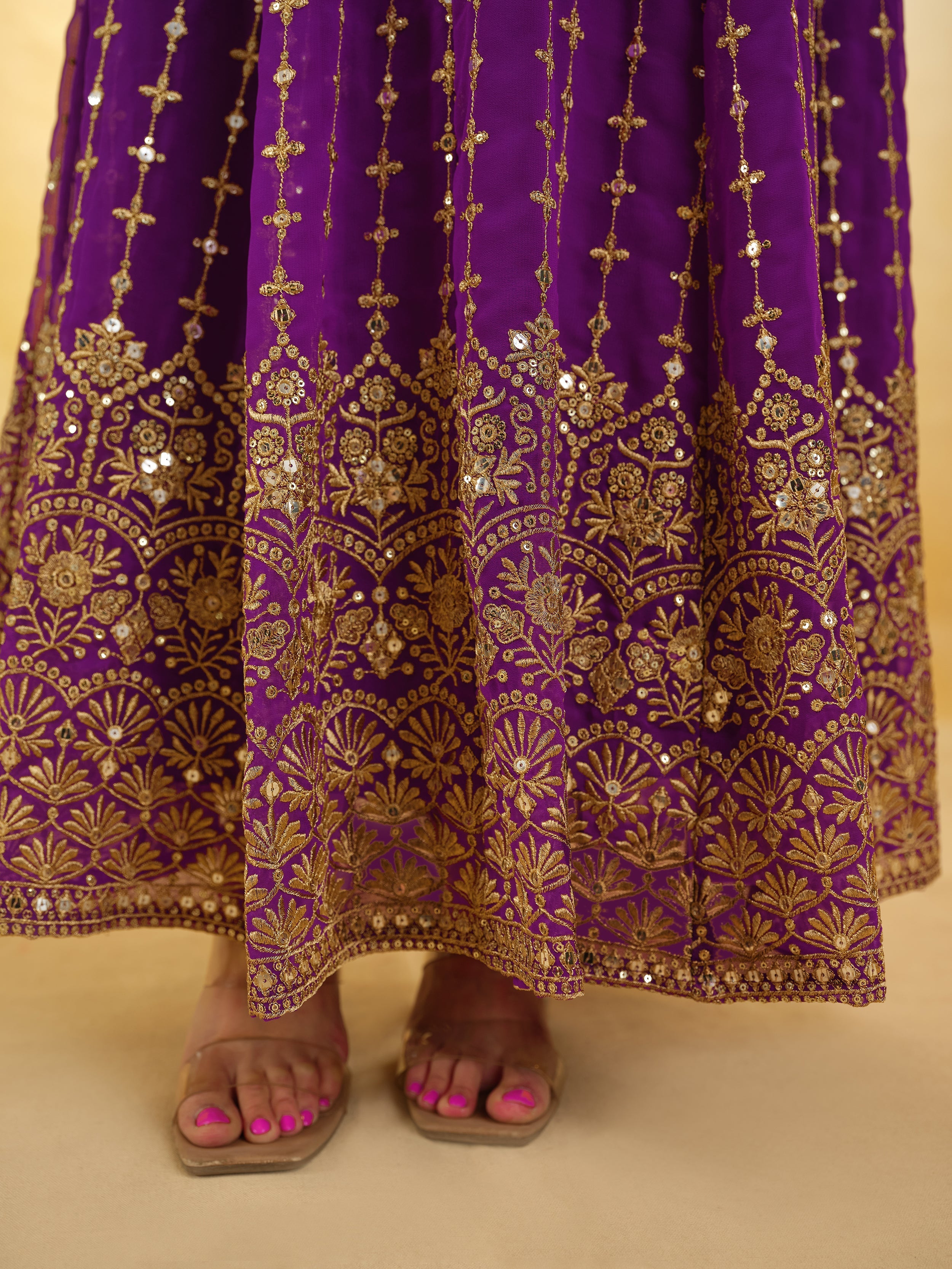 Captivating Purple Embroidered Georgette Wedding Wear Anarkali Suit with intricate detailing and elegant design