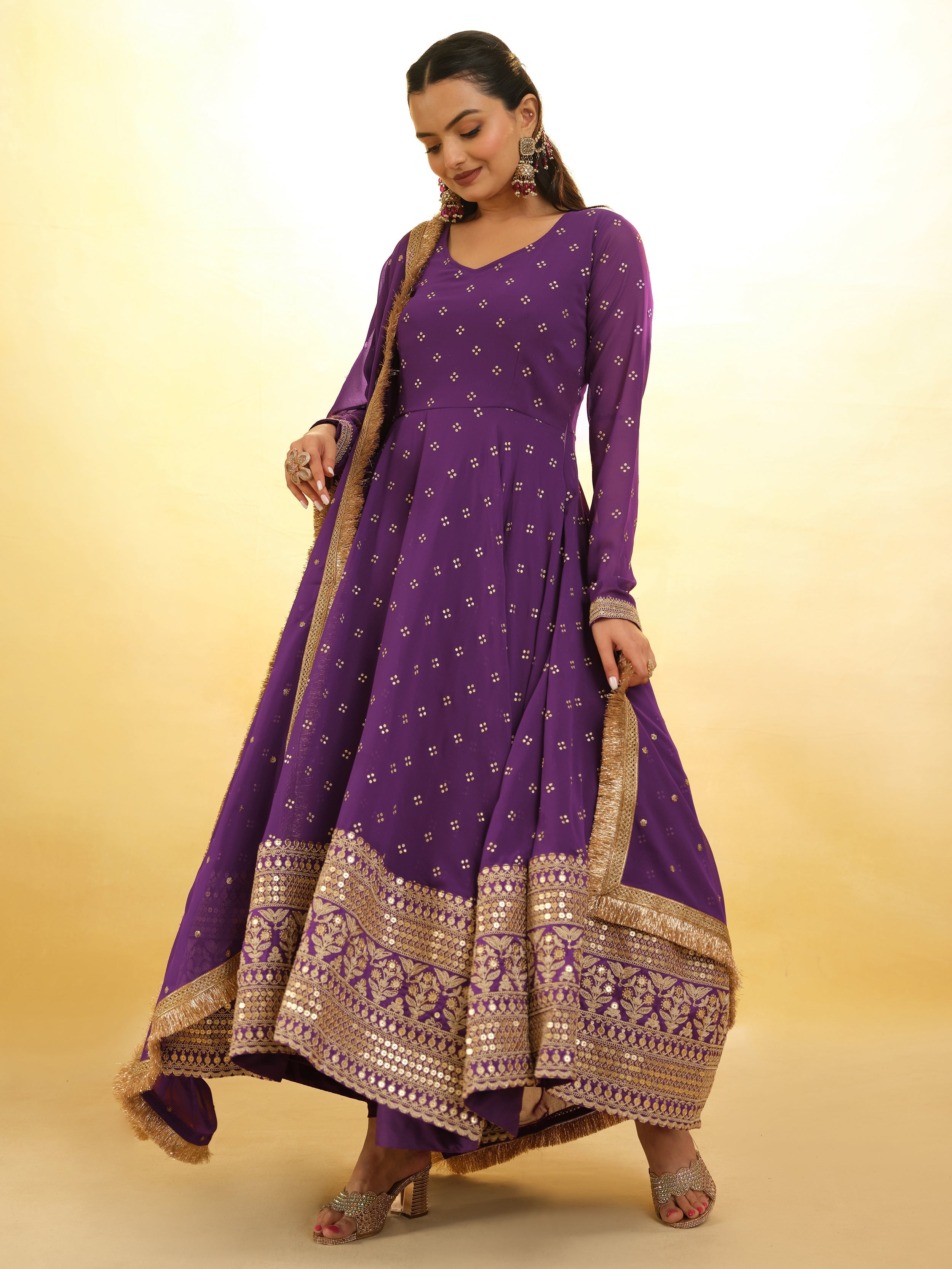 Fully stitched purple suit available in sizes XS to XXL for a flawless fit
