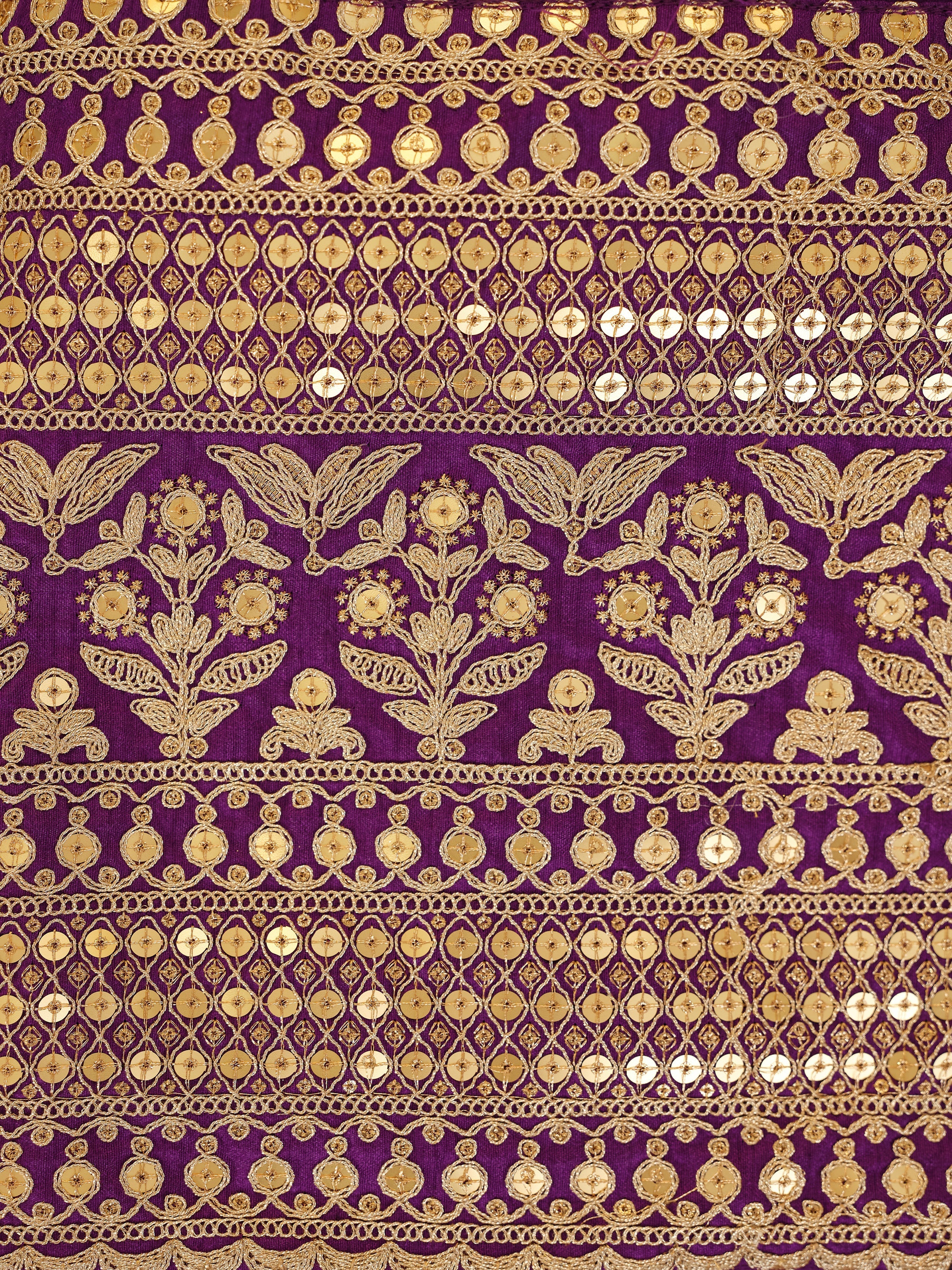 Purple suit with a personalized touch to your attire