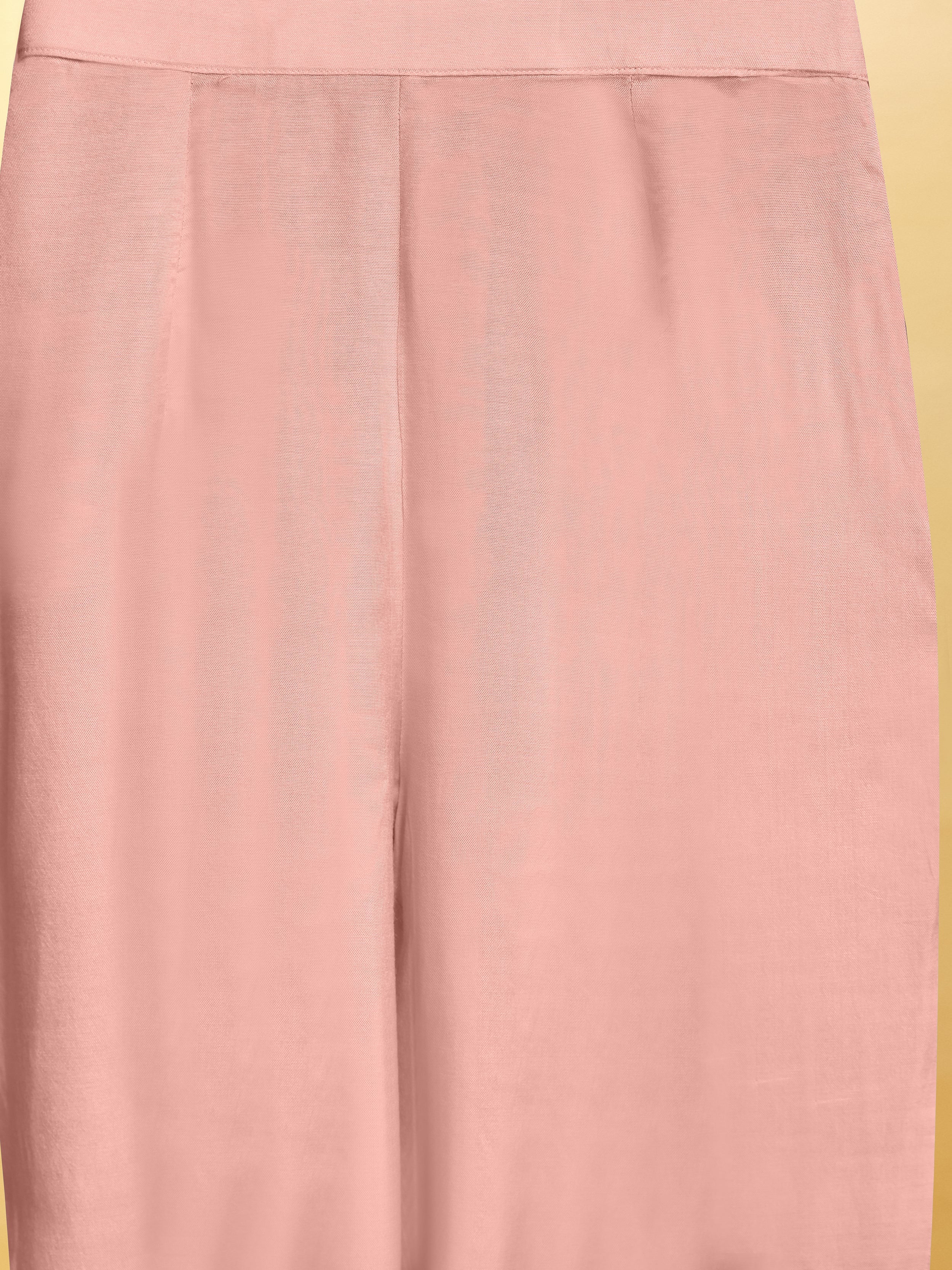 Charming baby pink suit with exquisite detailing