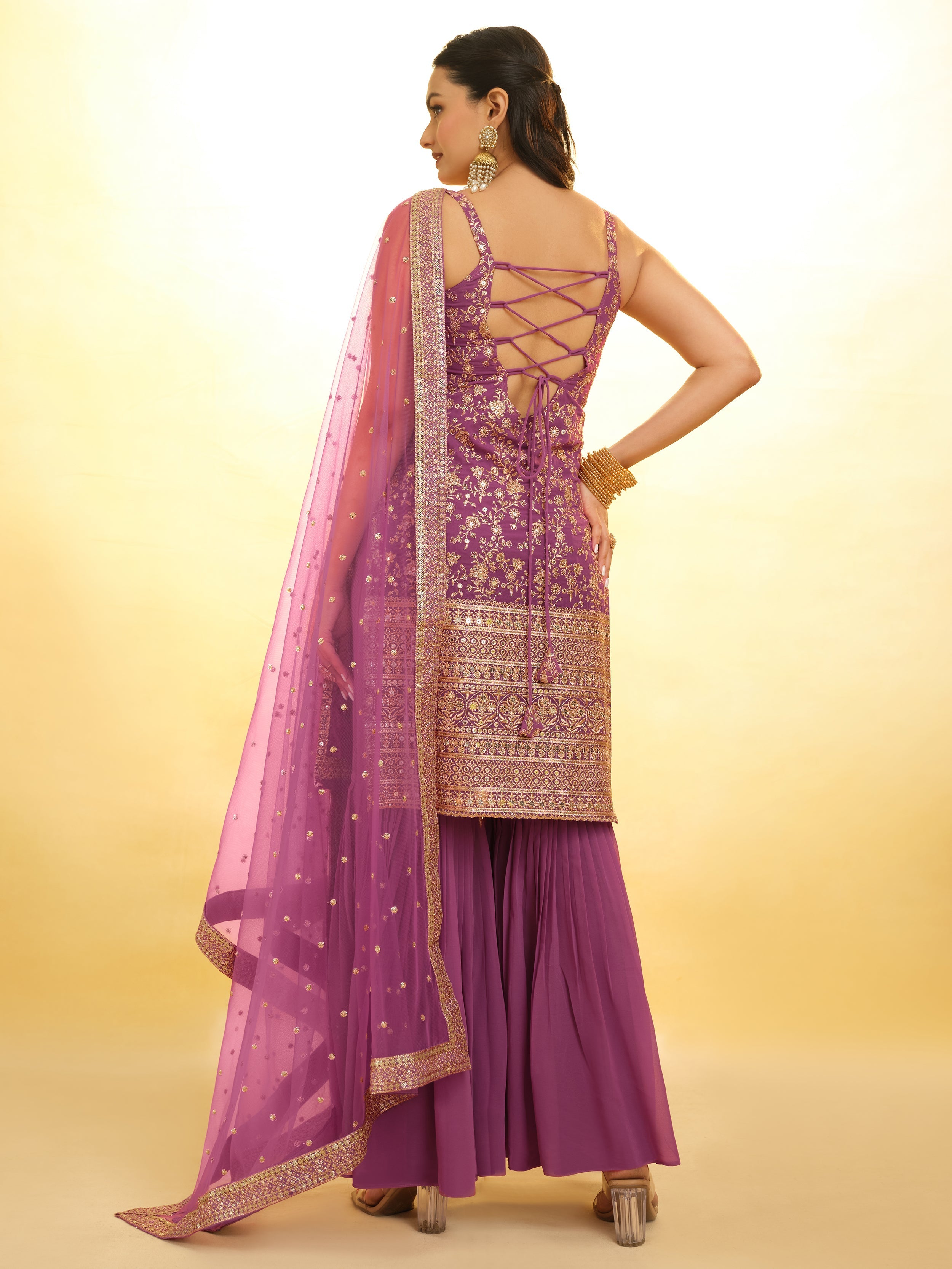 Purple sharara suit ensuring you stand out with style