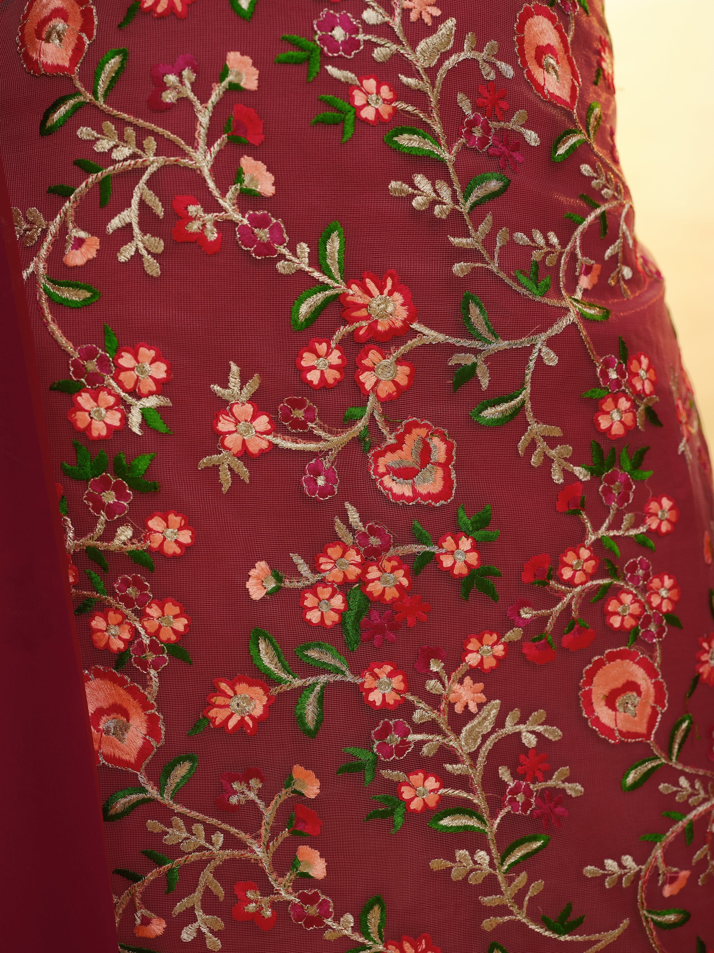 Maroon net sharara suit with intricate embroidery for festival wear