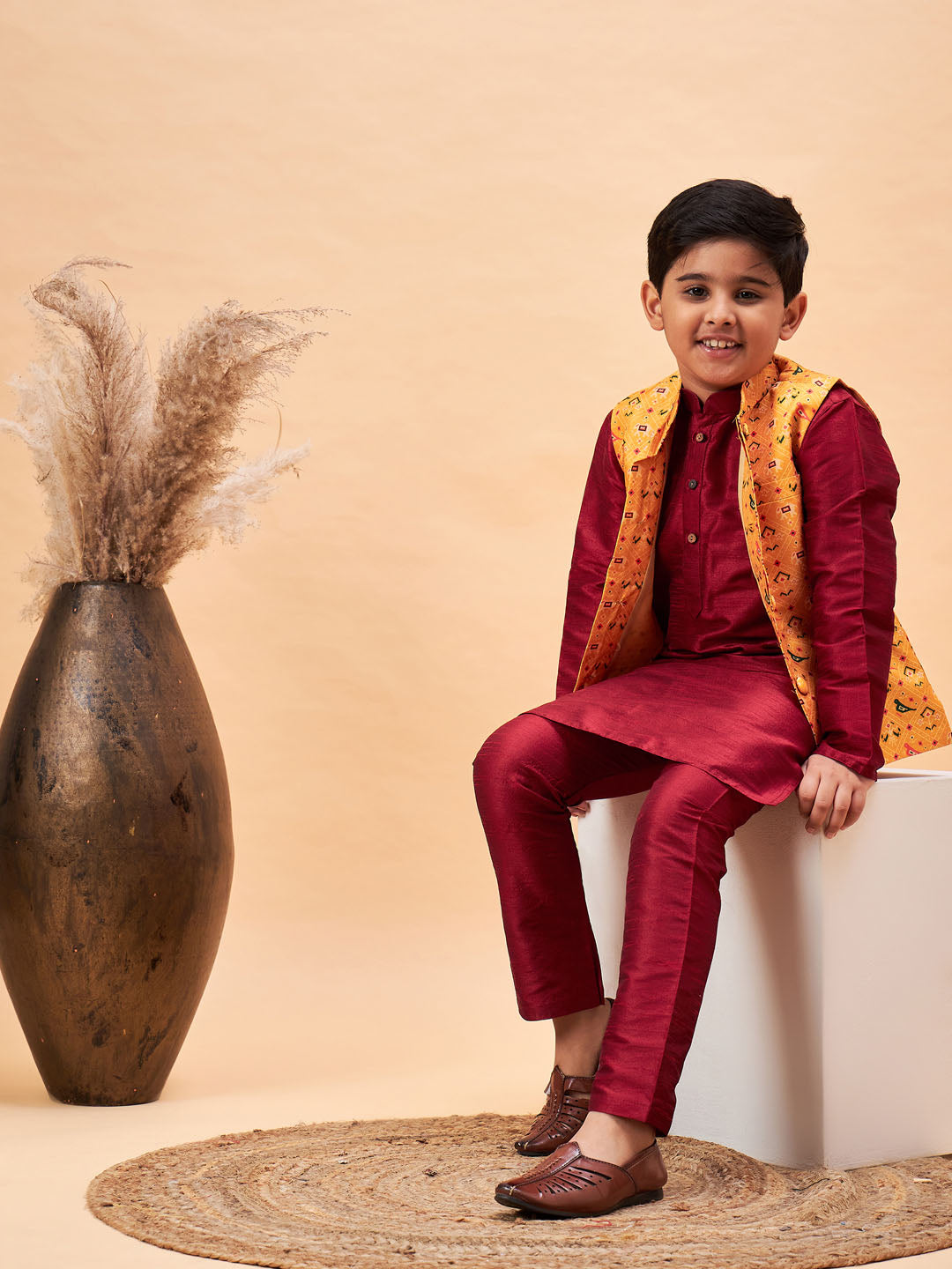 VASTRAMAY Boy's Yellow Ethnic Printed Jacket With Maroon Kurta and Pyjama Set - qivii