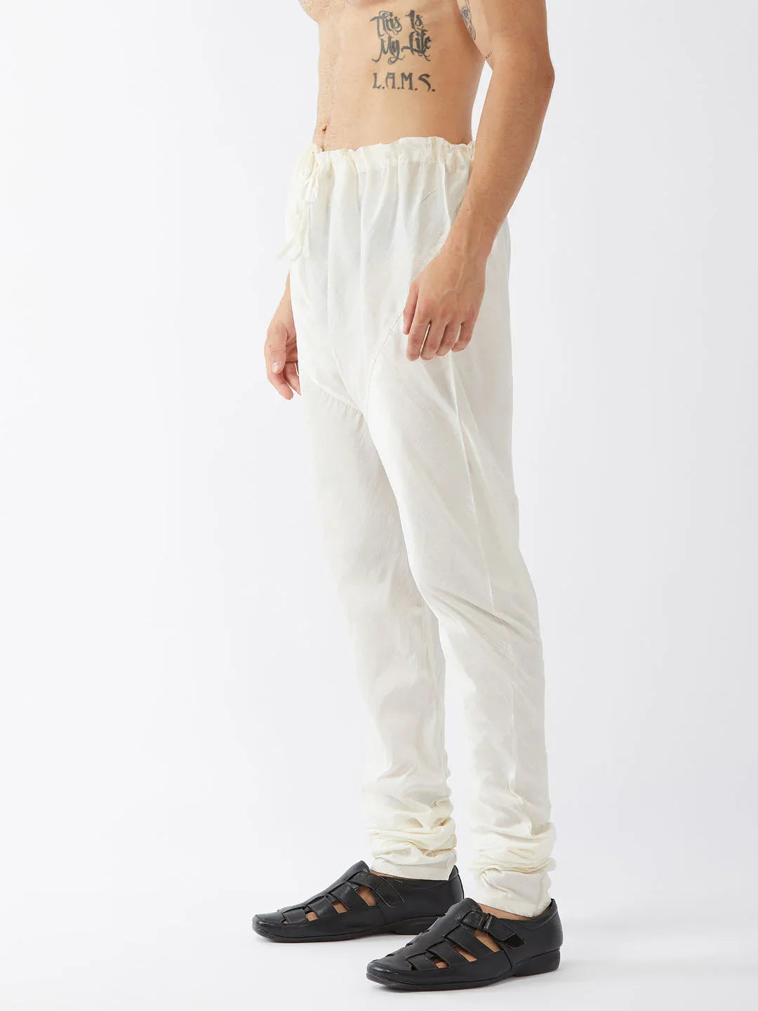 VASTRAMAY Men's Cream Solid Relax Fit Churidar