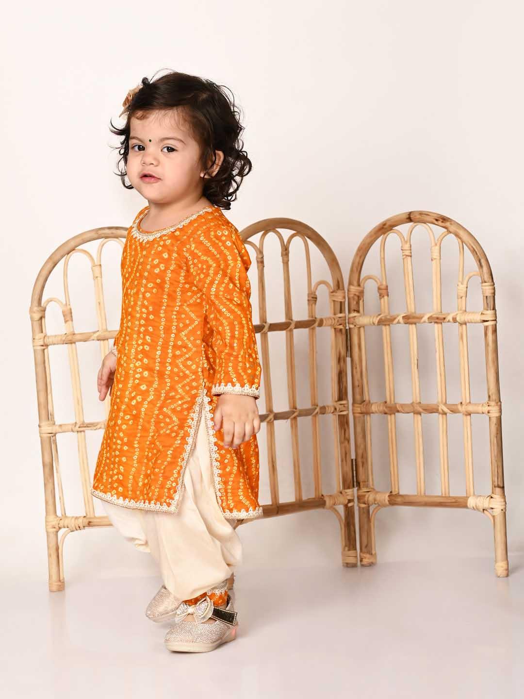 Girl's Yellow Bandhni Print Kurta And Patiala Set