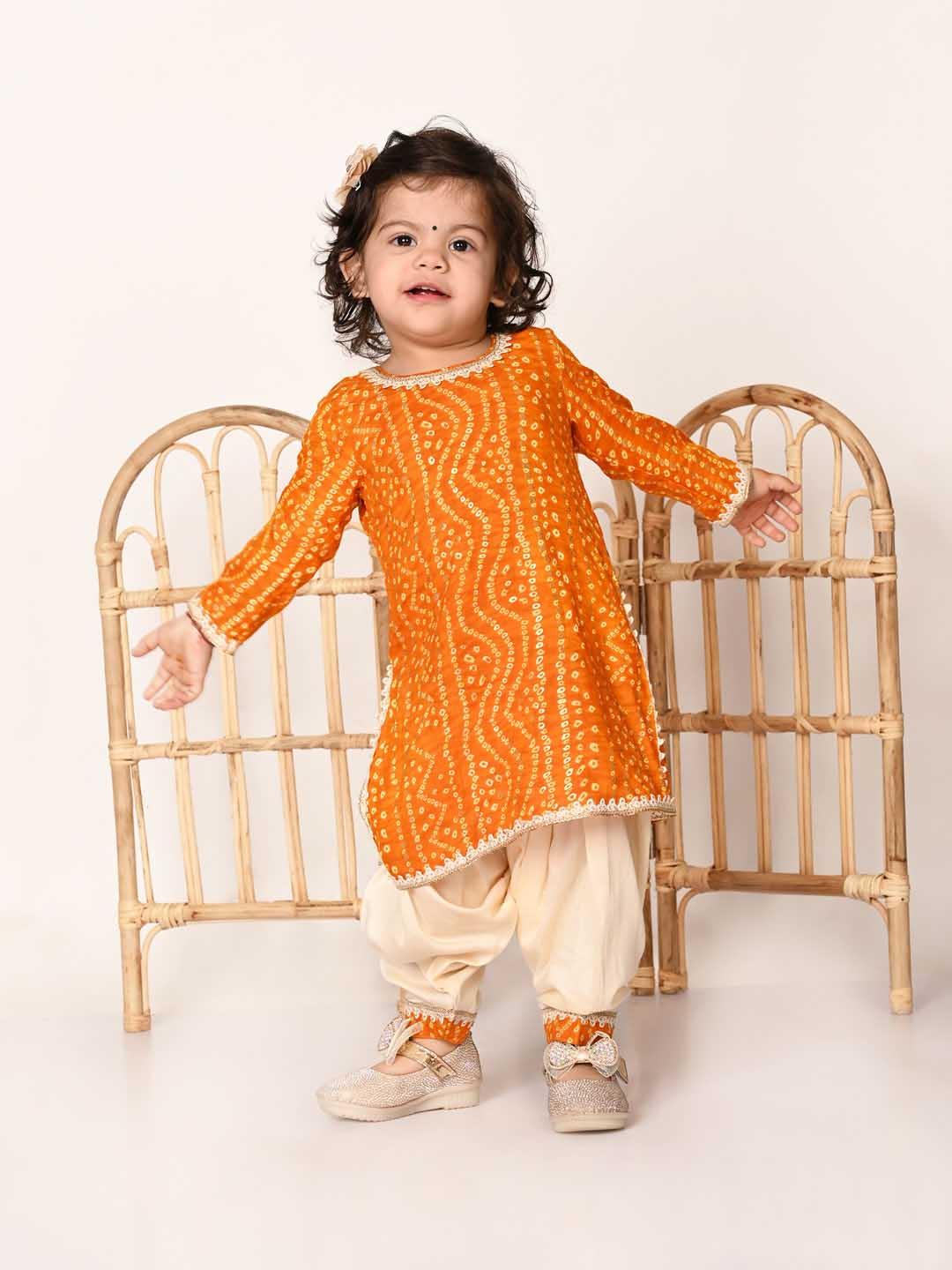 Girl's Yellow Bandhni Print Kurta And Patiala Set