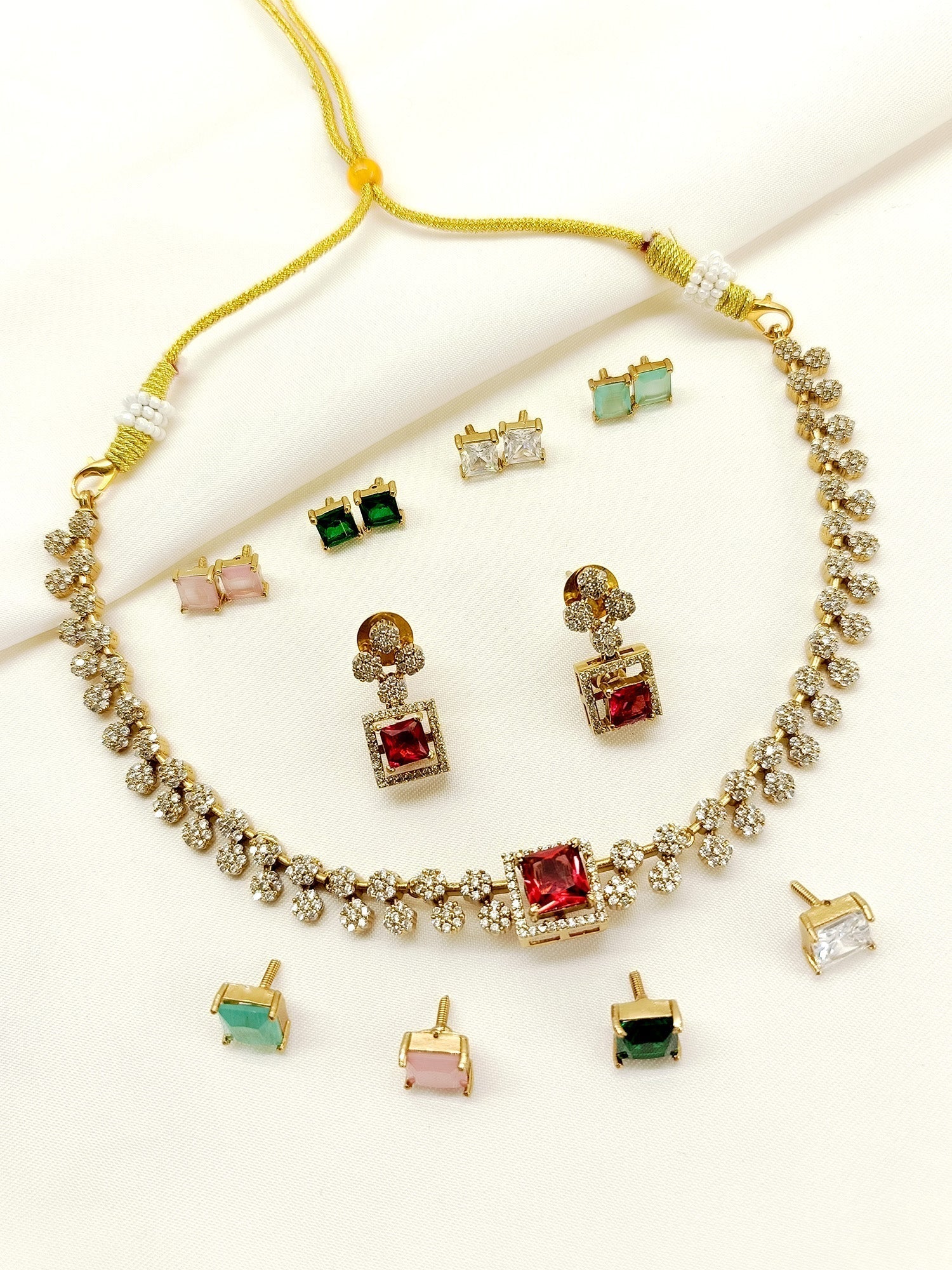 Multi-coloured Polki stones set in antique gold plated brass metal necklace