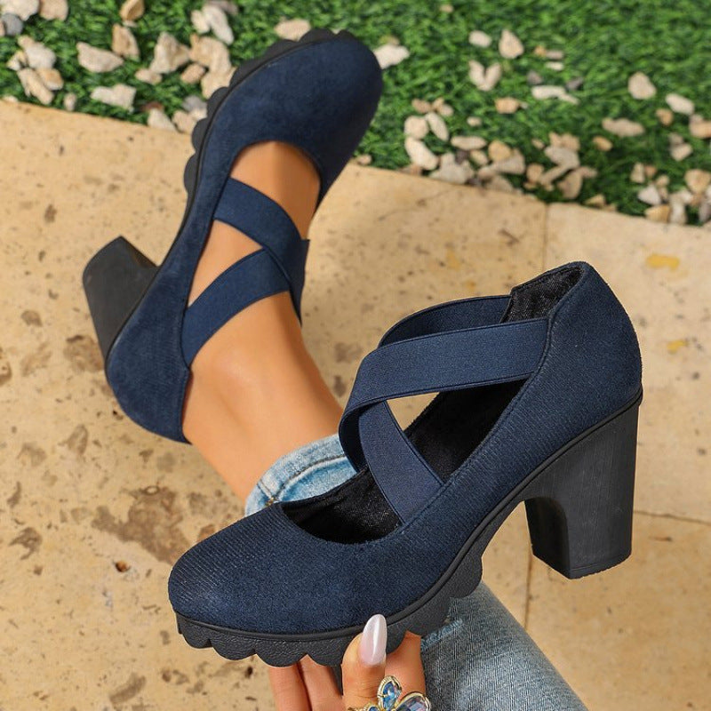 Women's Bootara Ainsley Mary Jane shoes in blue suede look with round toe, cross-strap, chunky lug sole, and block heels.