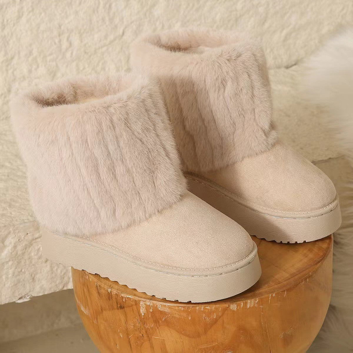 Beige women's Tundelle short winter boots by Bootara with faux fur cuff and slip-on platform design, available in US sizes 5-10.5.