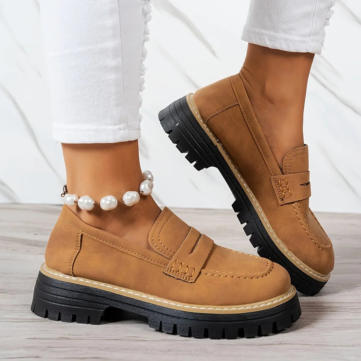 Brown women's orthopedic loafers by Qivii featuring comfortable, supportive design and classic style for everyday wear.