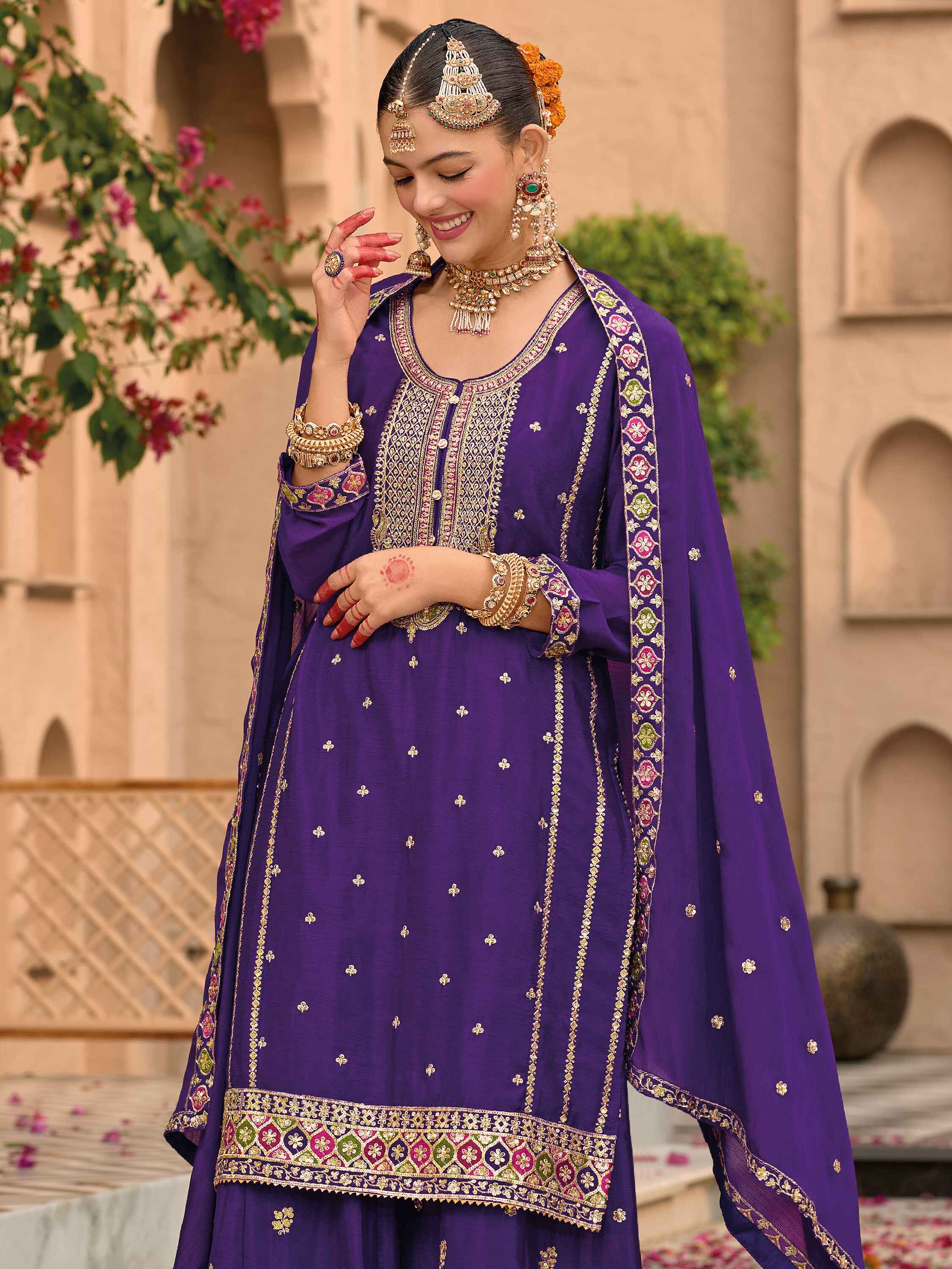 Lavish purple palazzo with intricate embroidery on both sides