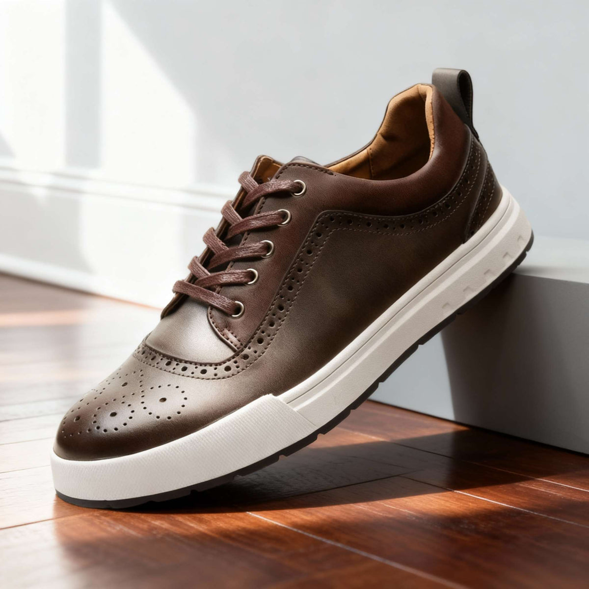 Charles Ray men's leather sneakers by Hudson Ridge on dark brown hardwood floor, showcasing stylish men's footwear.