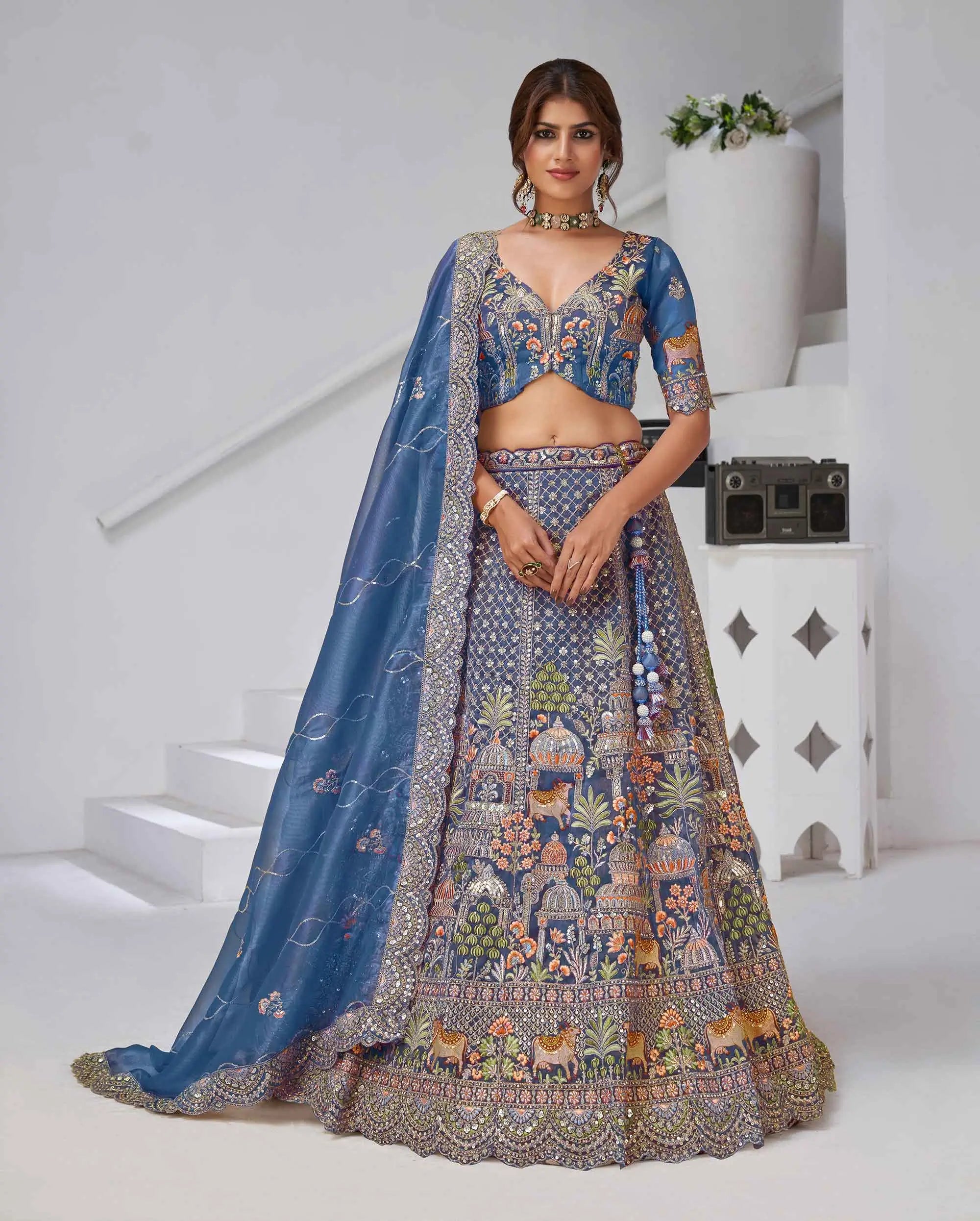Dusty Blue Bridal Lehenga With Temple & Cow Motifs - qivii
