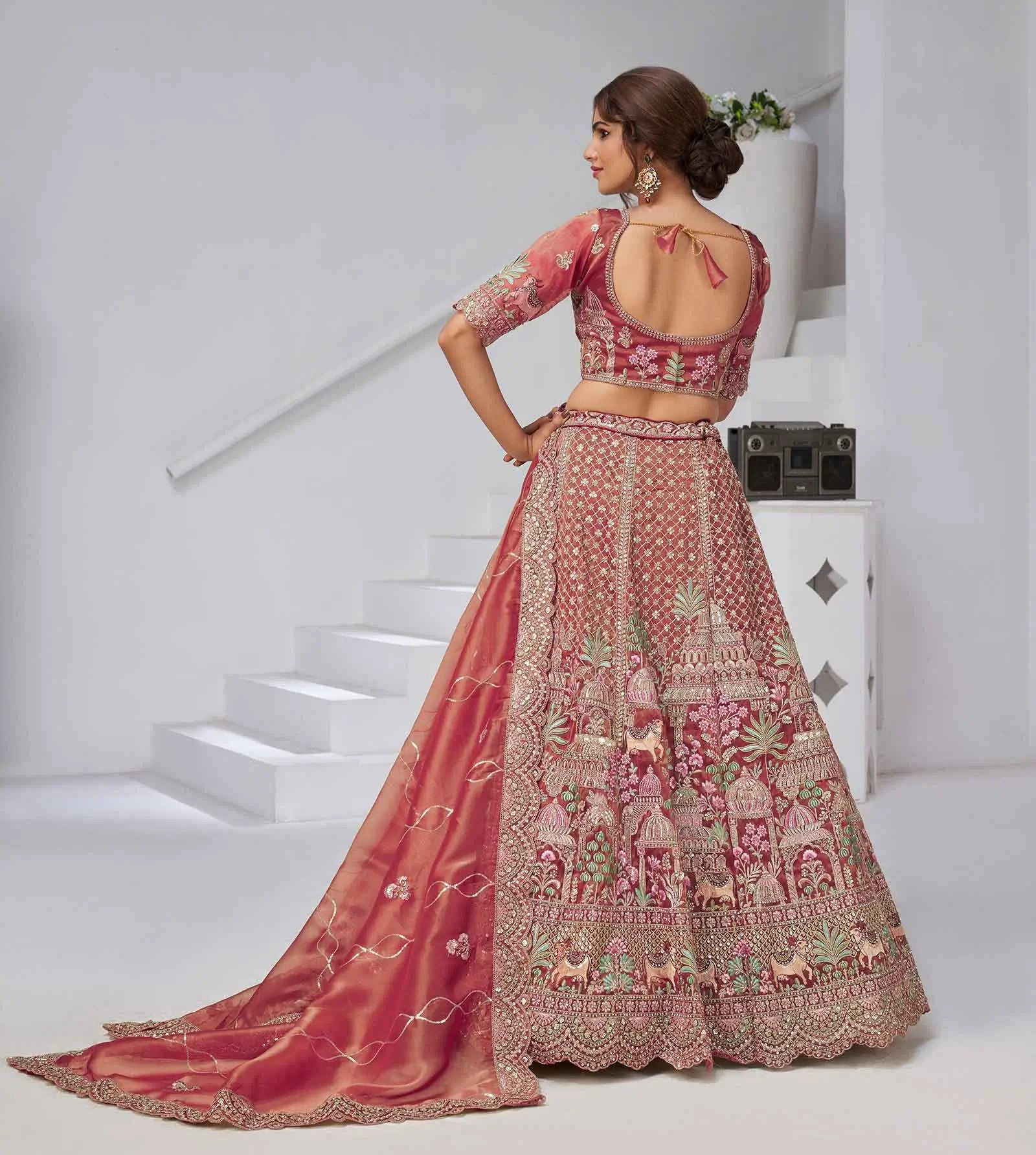 Pinkish Red Bridal Lehenga With Temple & Cow Motifs - qivii