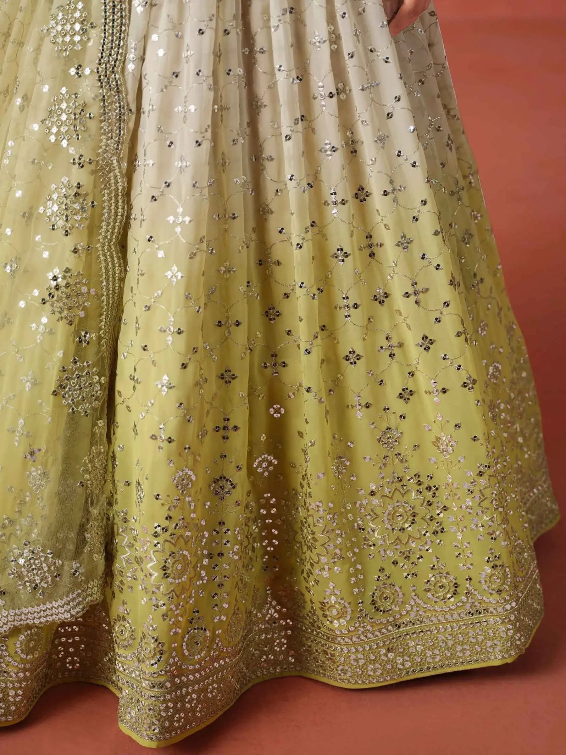 Yellow ombre embroidered lehenga with detailed silver sequin and beadwork on fabric