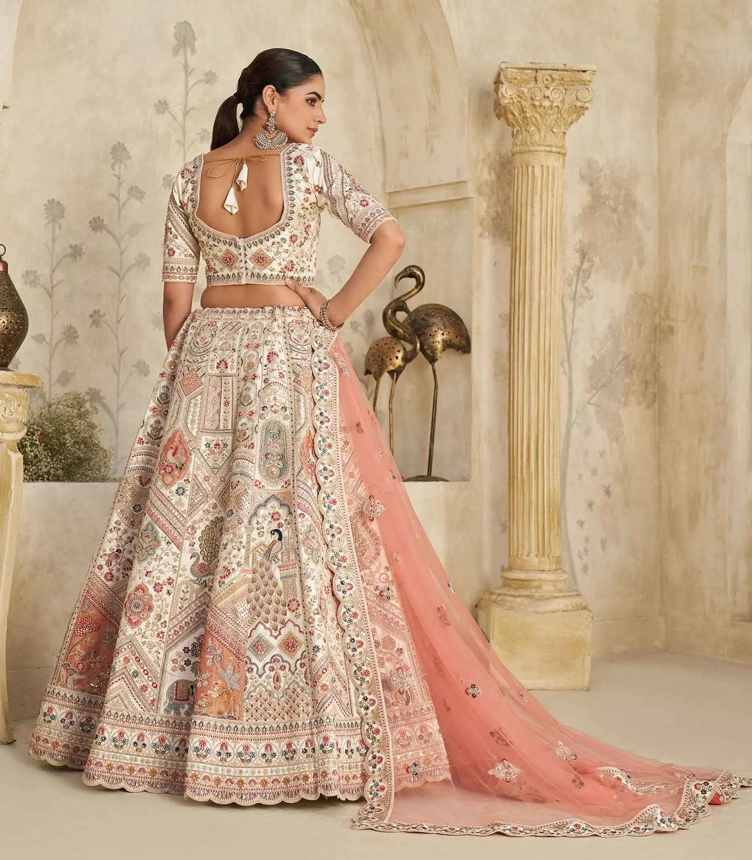 Cream Lehenga With Intricate Royal Embroidery Motifs - qivii