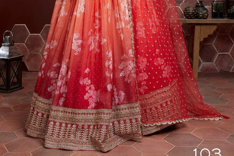 Unstitched Tebby silk choli with real mirror work and delicate embroidery in net fabric