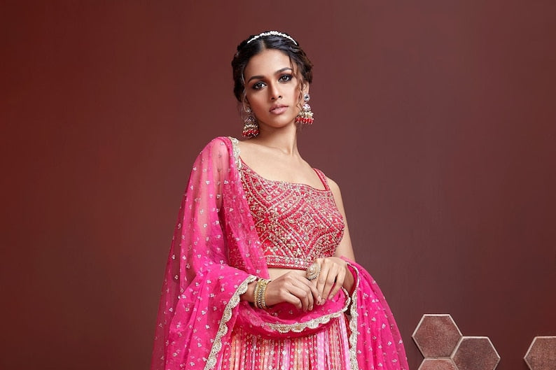 Designer pink lehenga choli with heavy sequence embroidery work, crafted for the wedding season