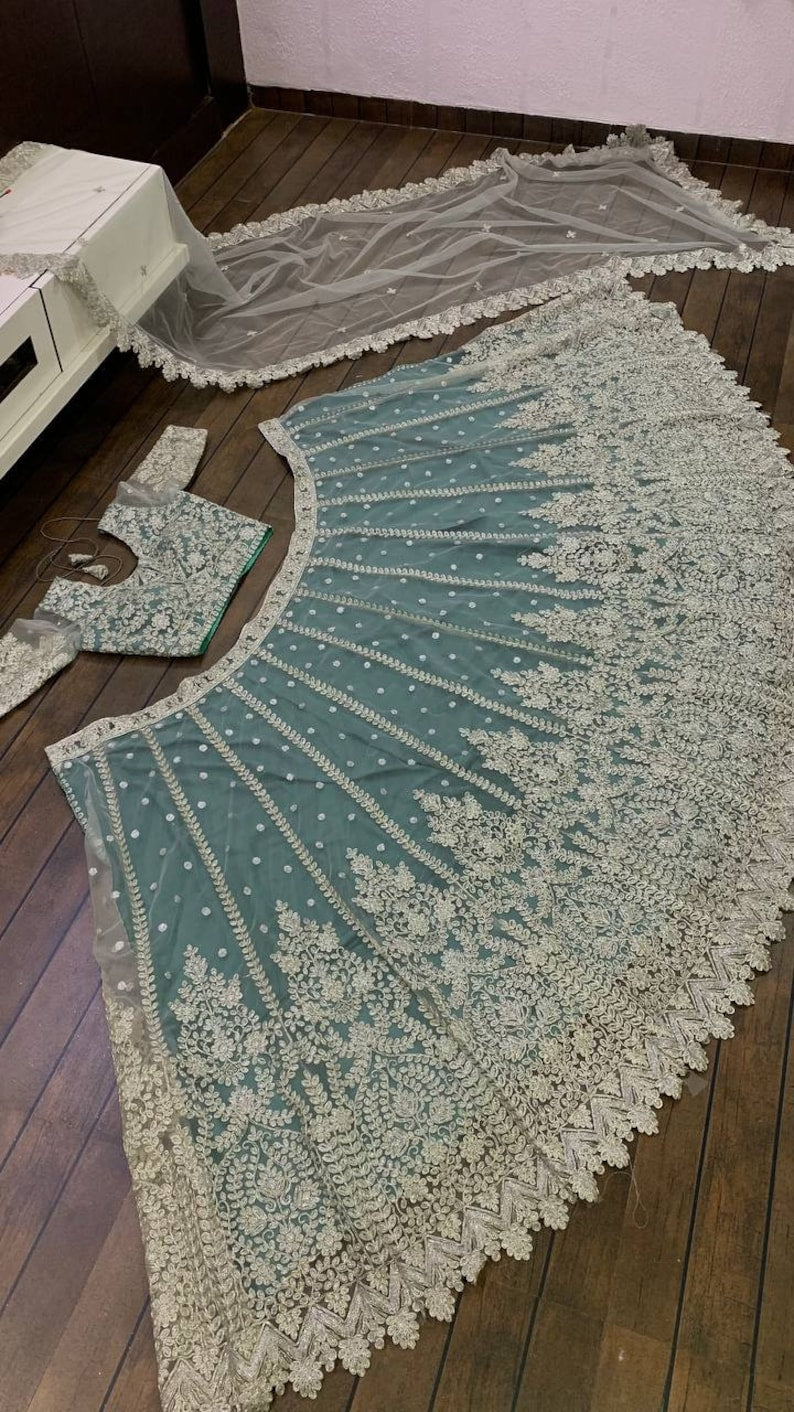 Unstitched grey Lehenga Choli with heavy chine sequence work