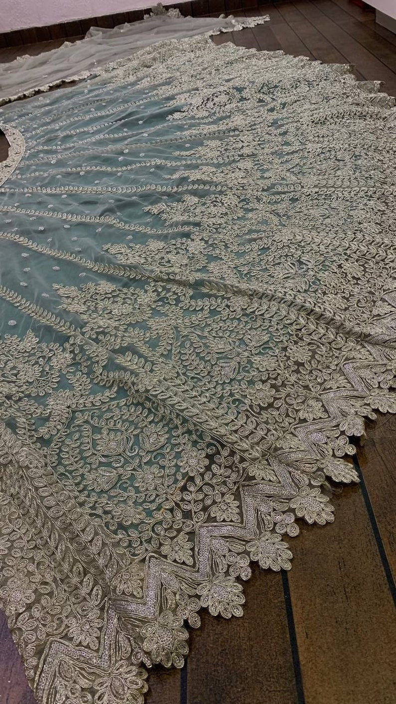 Grey Lehenga Choli with heavy soft net fabric and heavy chine sequence work