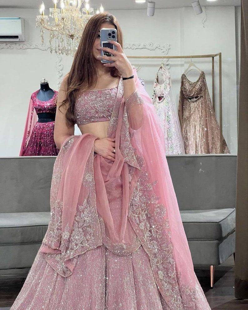 Sabyasachi Designer peach-pink Lehenga Choli with Shimmer Dori Work