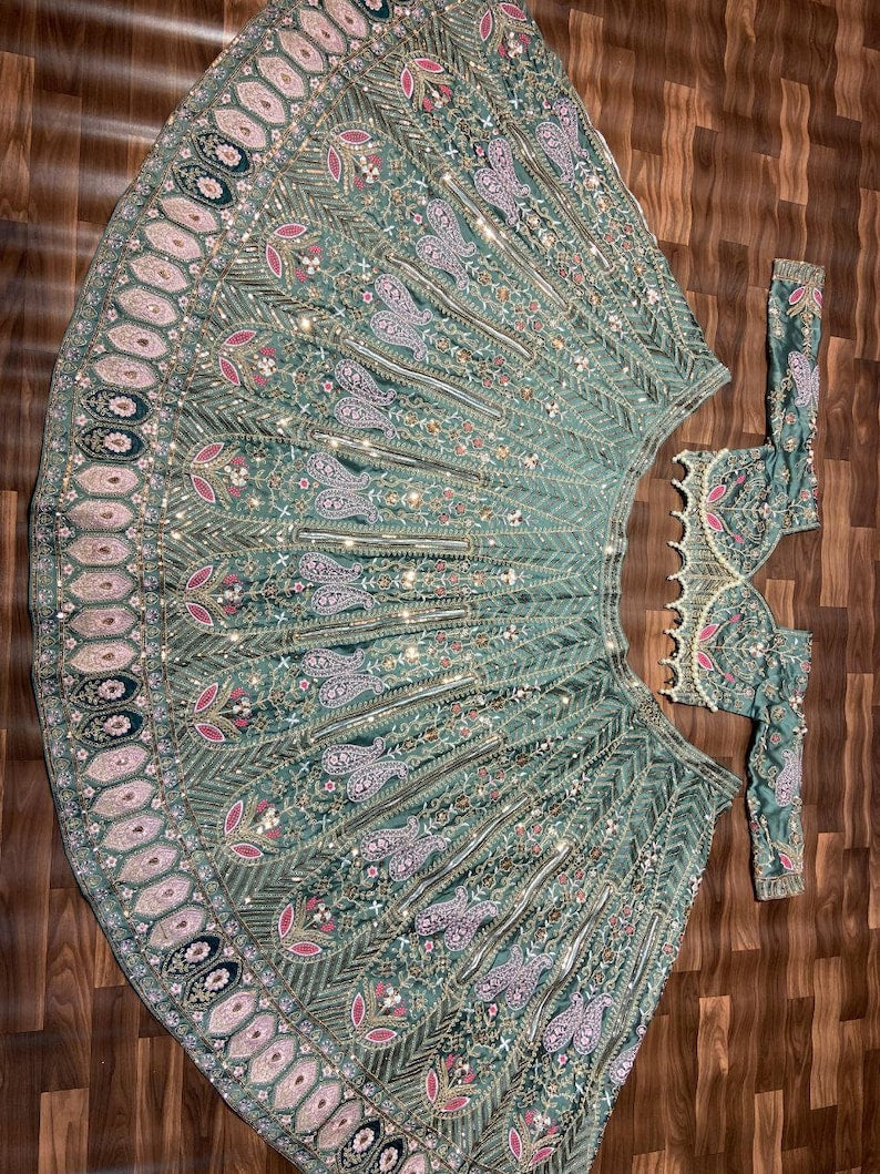 Exquisite red and gold designer lehenga choli for wedding and party wear