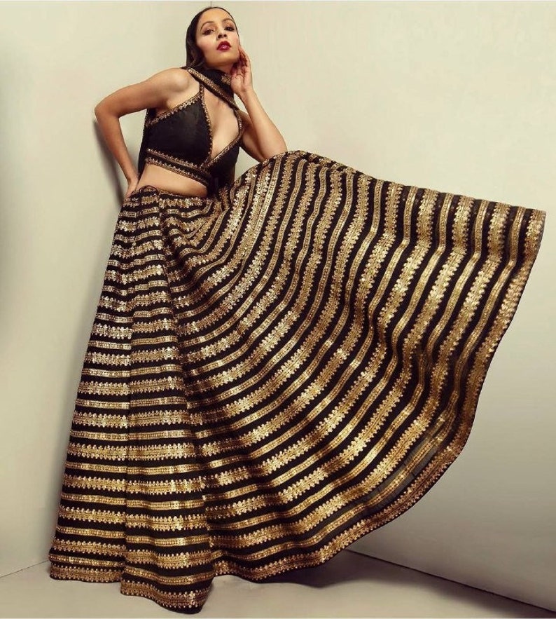 Designer black lehenga choli with high quality embroidery work for party or evening wear bollywood style