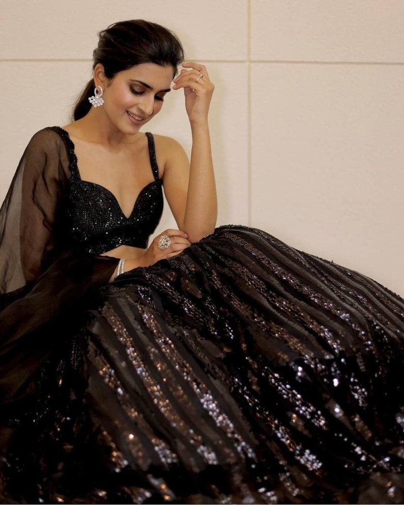 Handcrafted bridal lehenga choli with organza fabric and embroidery border work