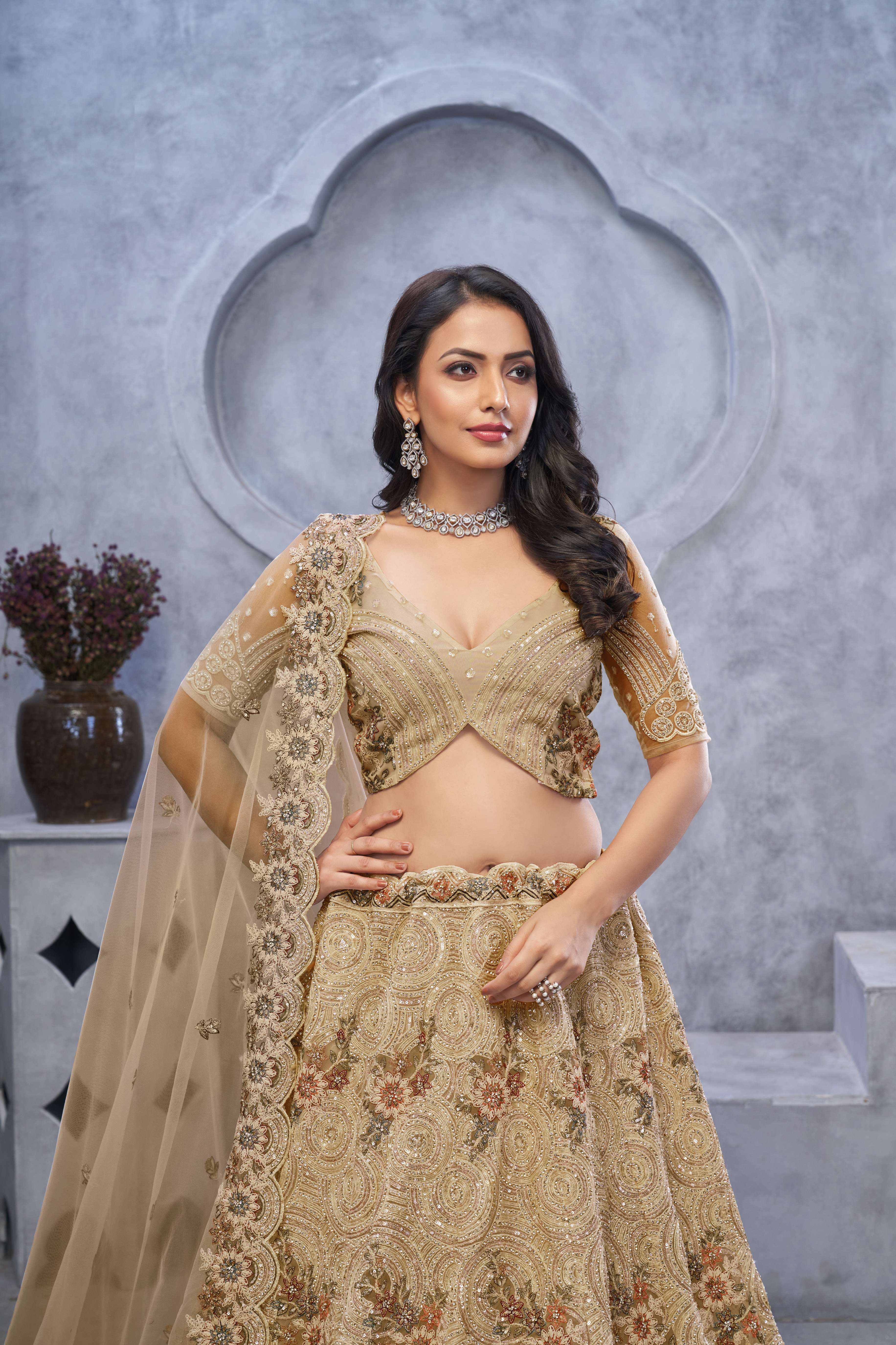 Golden Sangeet Lehenga Choli with Alluring Bel Butti Pattern - qivii