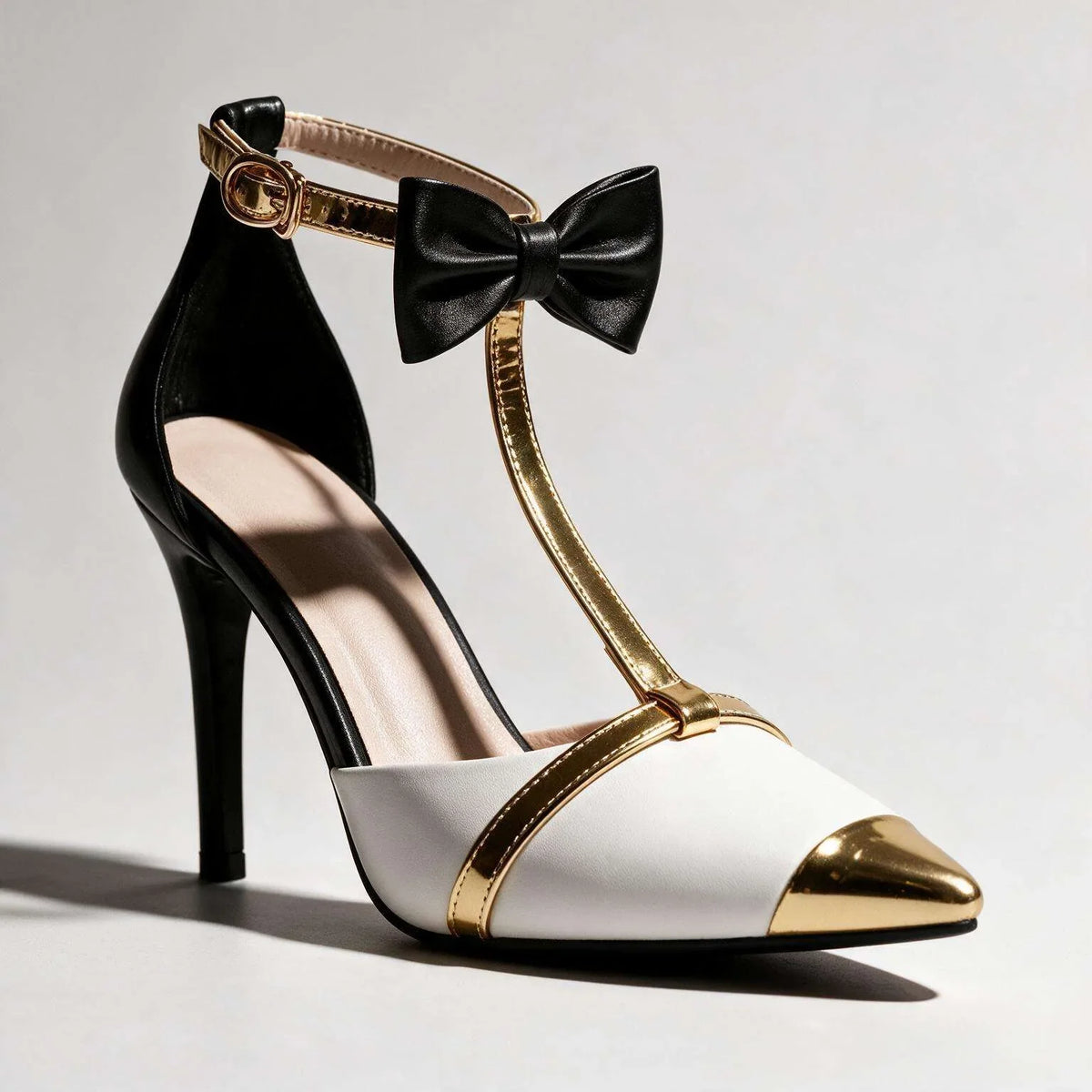 Pair of Larissa Bow Tie Heels by Qivii, stylish women's footwear with elegant bow details and a multi-color design.