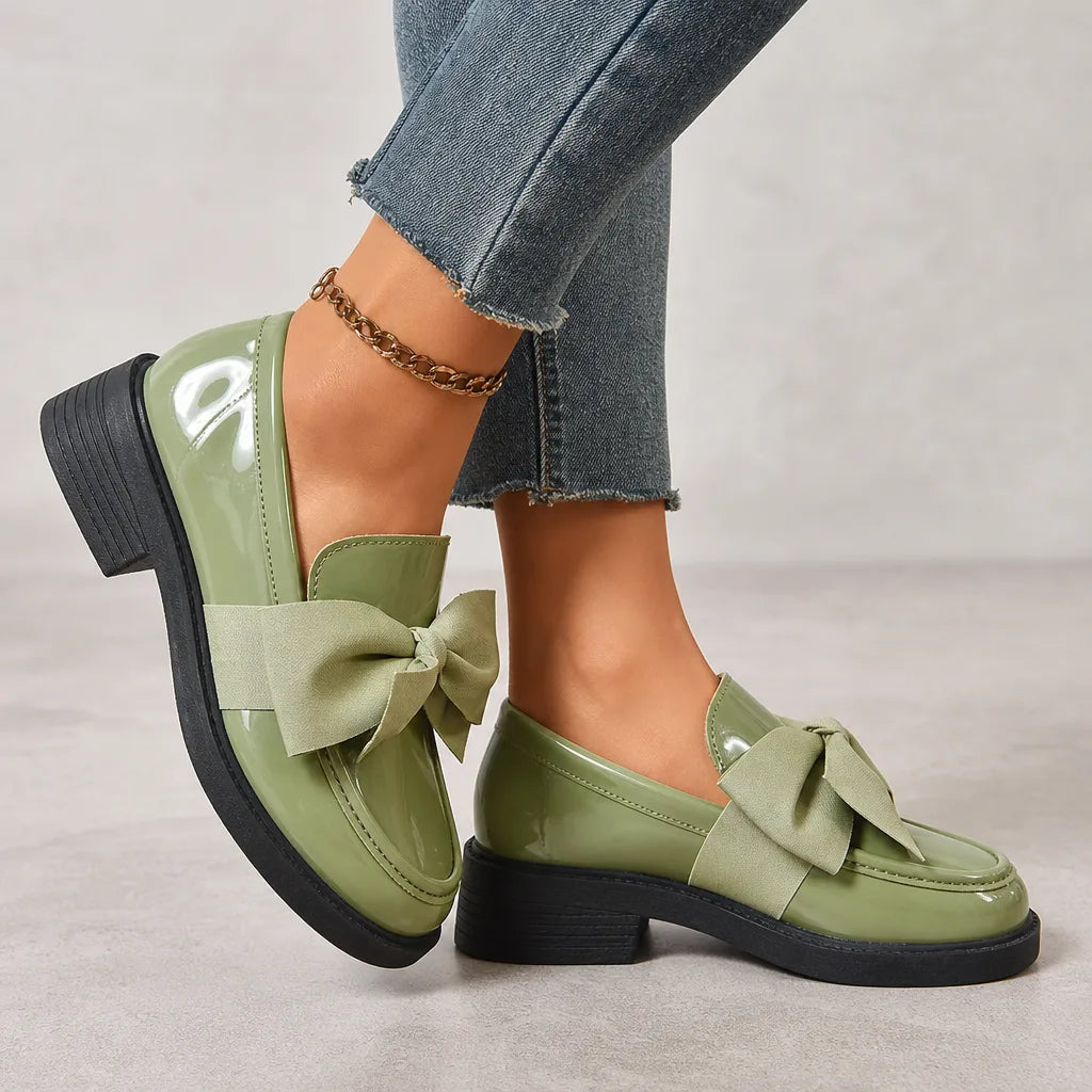 Green Lawrence women's bow loafers by Hudson Ridge, stylish and comfortable women's footwear with a classic design.