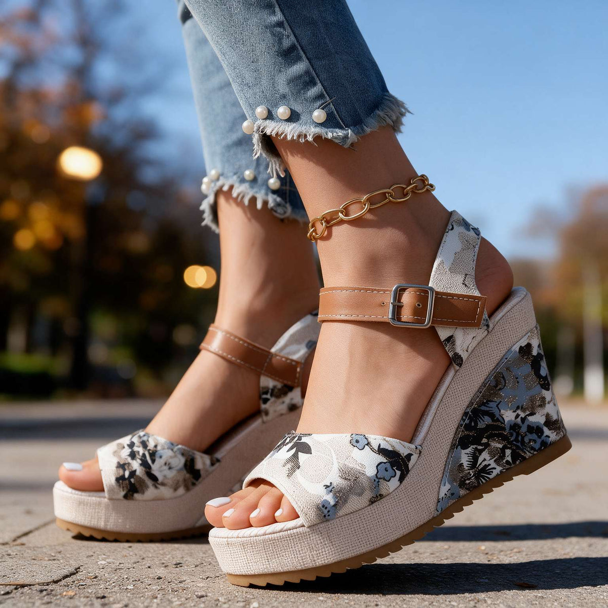Close-up of Alessia women's buckle platform sandal heels by Hudson Ridge, showing detailed straps and textured sole.