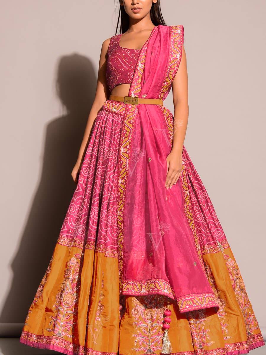 Pink Satin and tapeta silk lehenga with intricate Dori, thread, and sequence work
