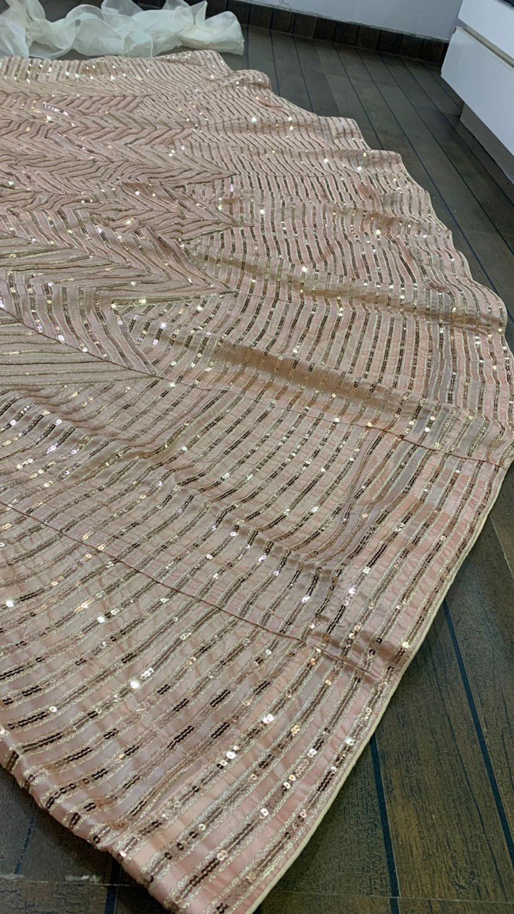 Beautiful Lite Pink Kasturi silk lehnga with intricate zari and sequence work details