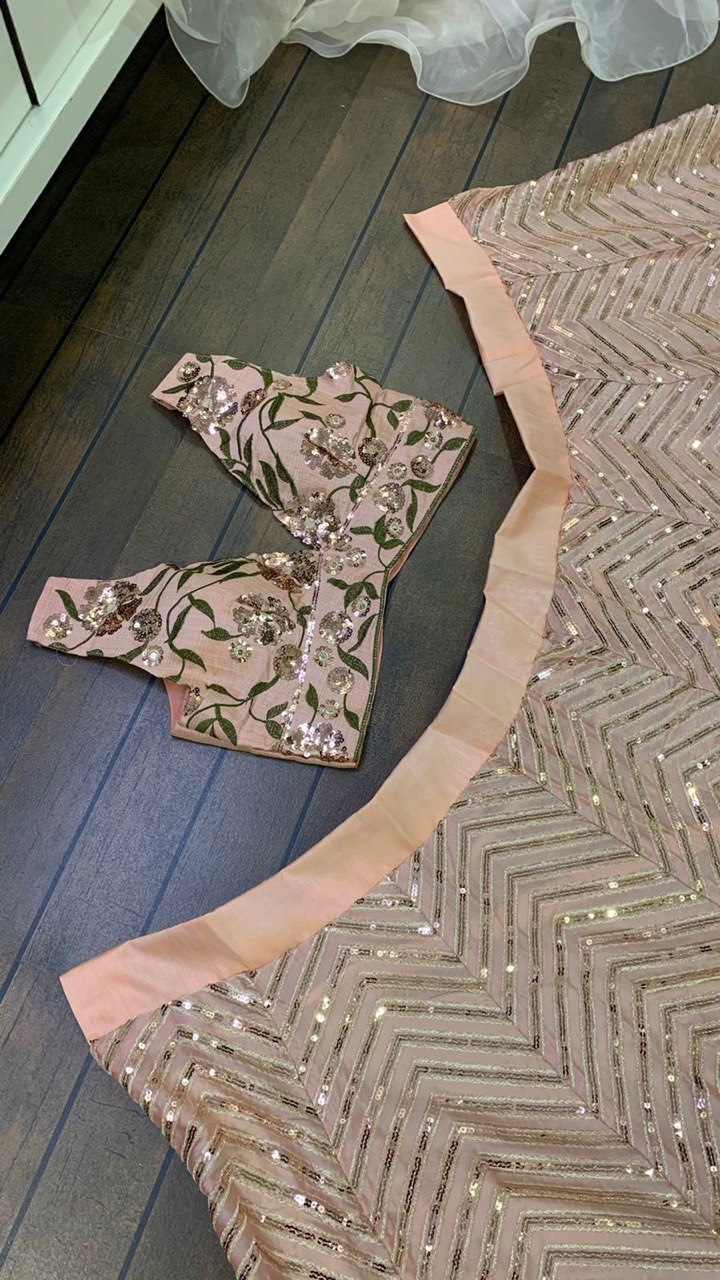 Lite Pink Kasturi silk lehnga with zari & sequence work - INSPIRED - Elegant traditional Indian bridal outfit with intricate embellishments and delicate pink silk fabric