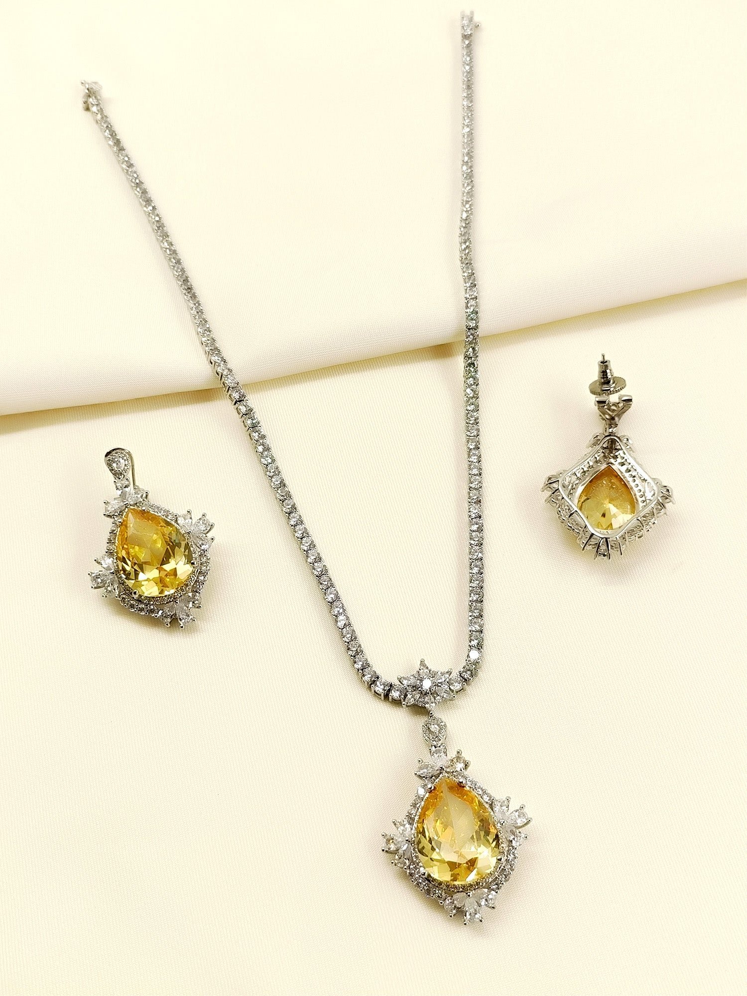 Mehar Yellow American Diamond Pendant Set - qivii