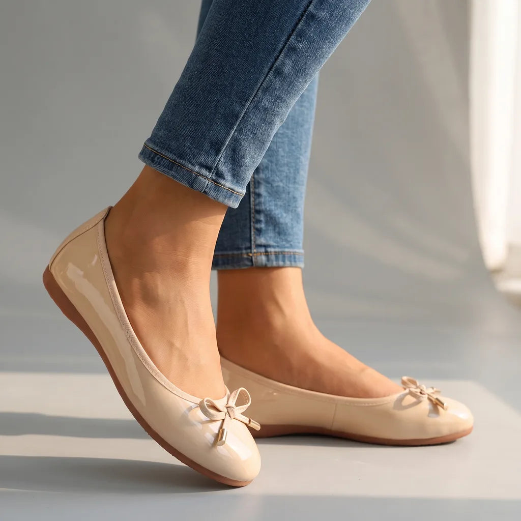 Beige Wolfe women's ballet flats from Hudson Ridge, slip-on footwear with a sleek, comfortable design for everyday wear.