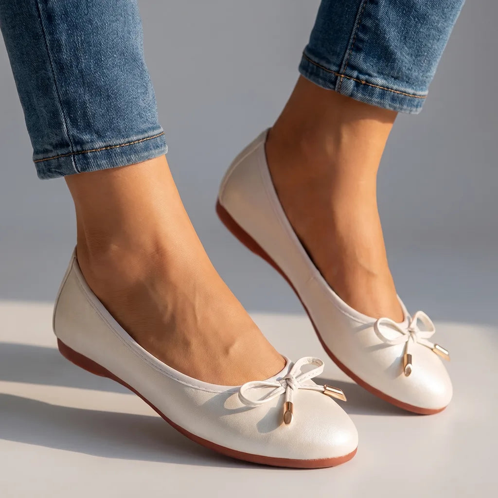 White Wolfe women's ballet flats by Hudson Ridge, lightweight slip-on footwear with a sleek, comfortable design.