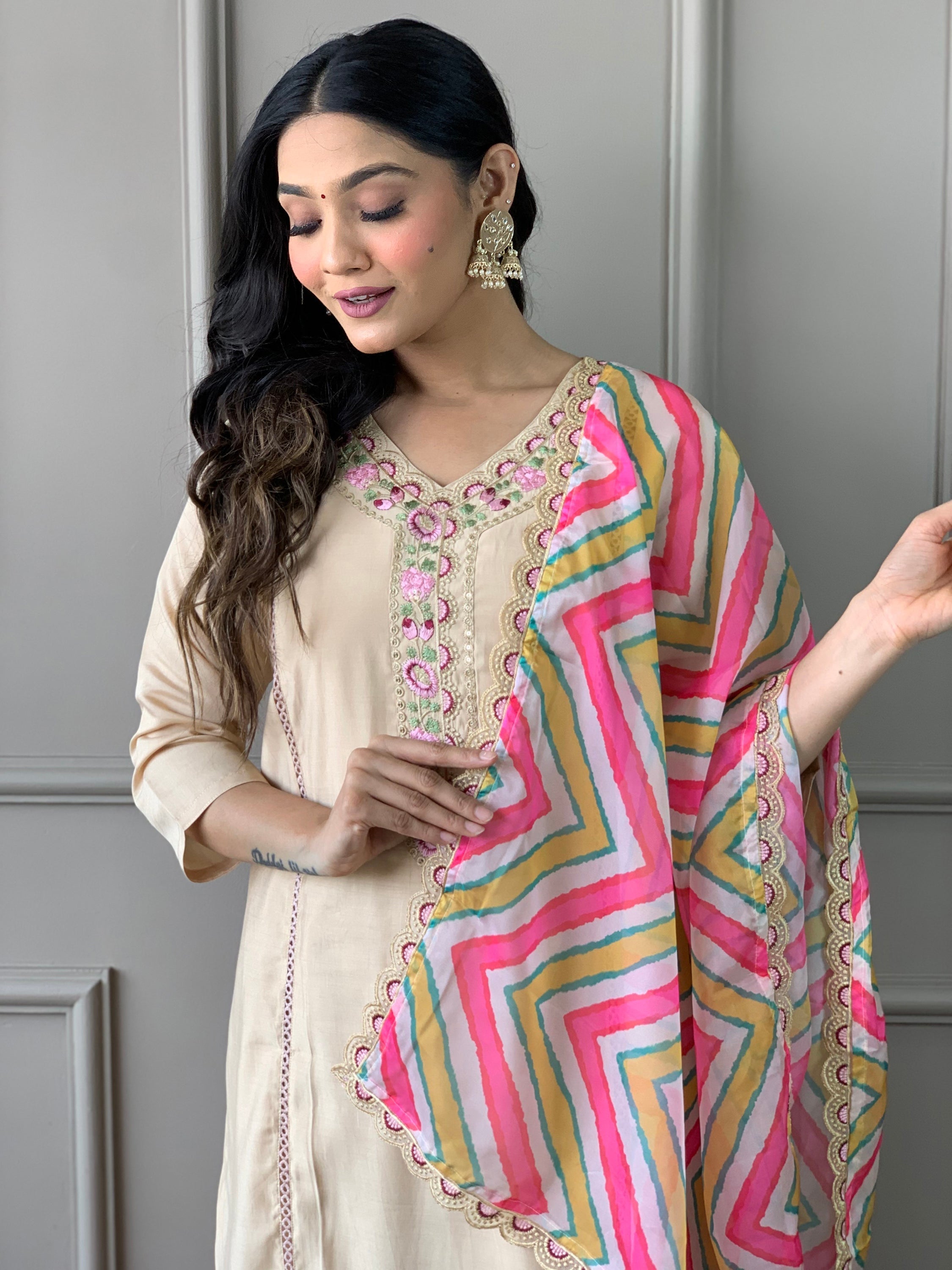 Matching beige chanderi silk pant for a complete ensemble
