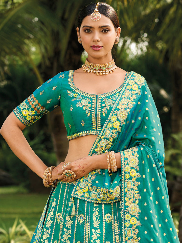 Teal Banarasi Silk Heavy Embroidered Cut Work Semi Stitched Lehenga Choli