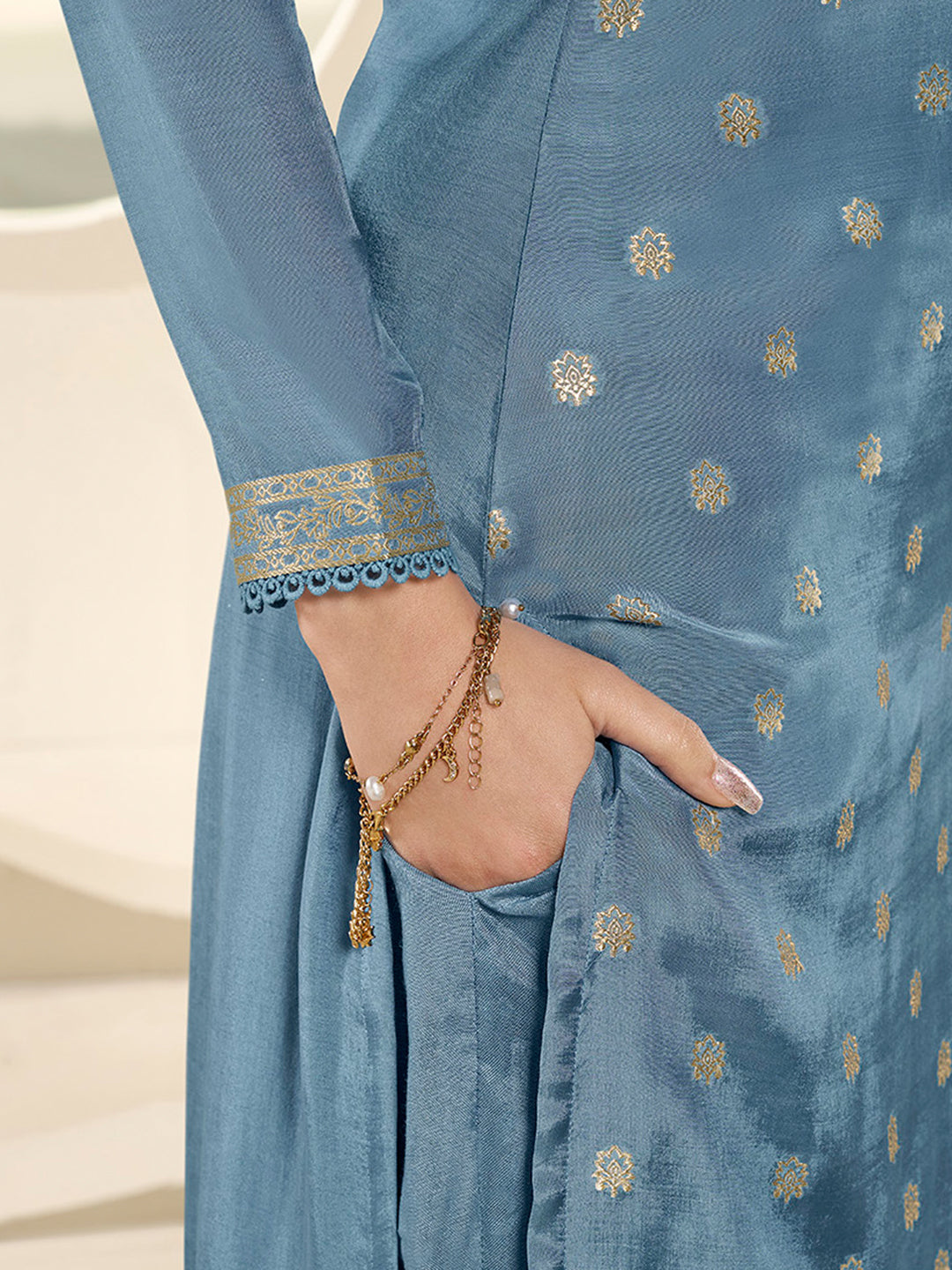 Sky Blue Muslin Jacquard Kurta Suit Set with Champagne Thread Weave and Pencil Sketch Weave Yoke by Qivii